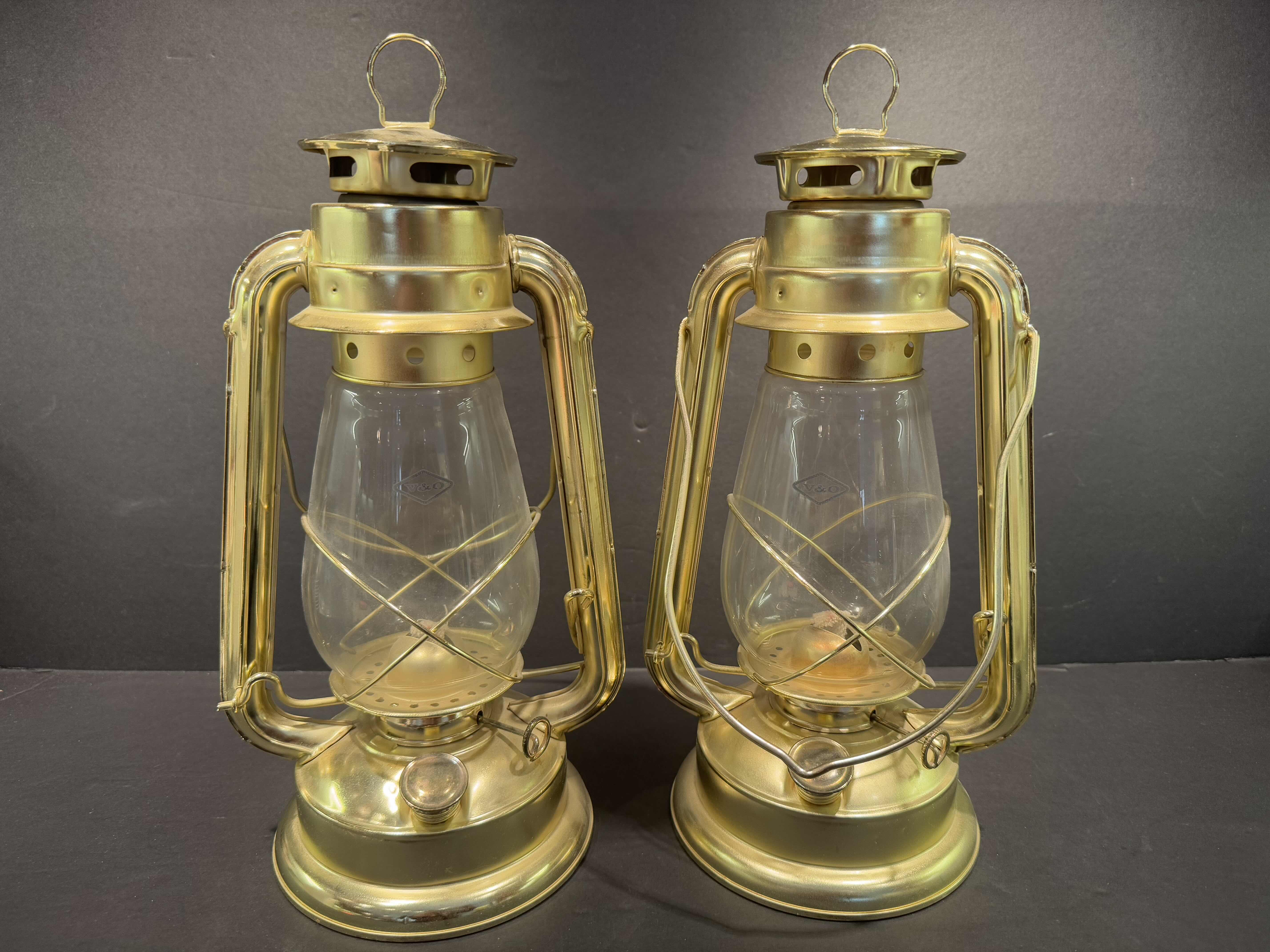 Photo 1 of 2- GOLD COLORED  KEROSENE LANTERNS