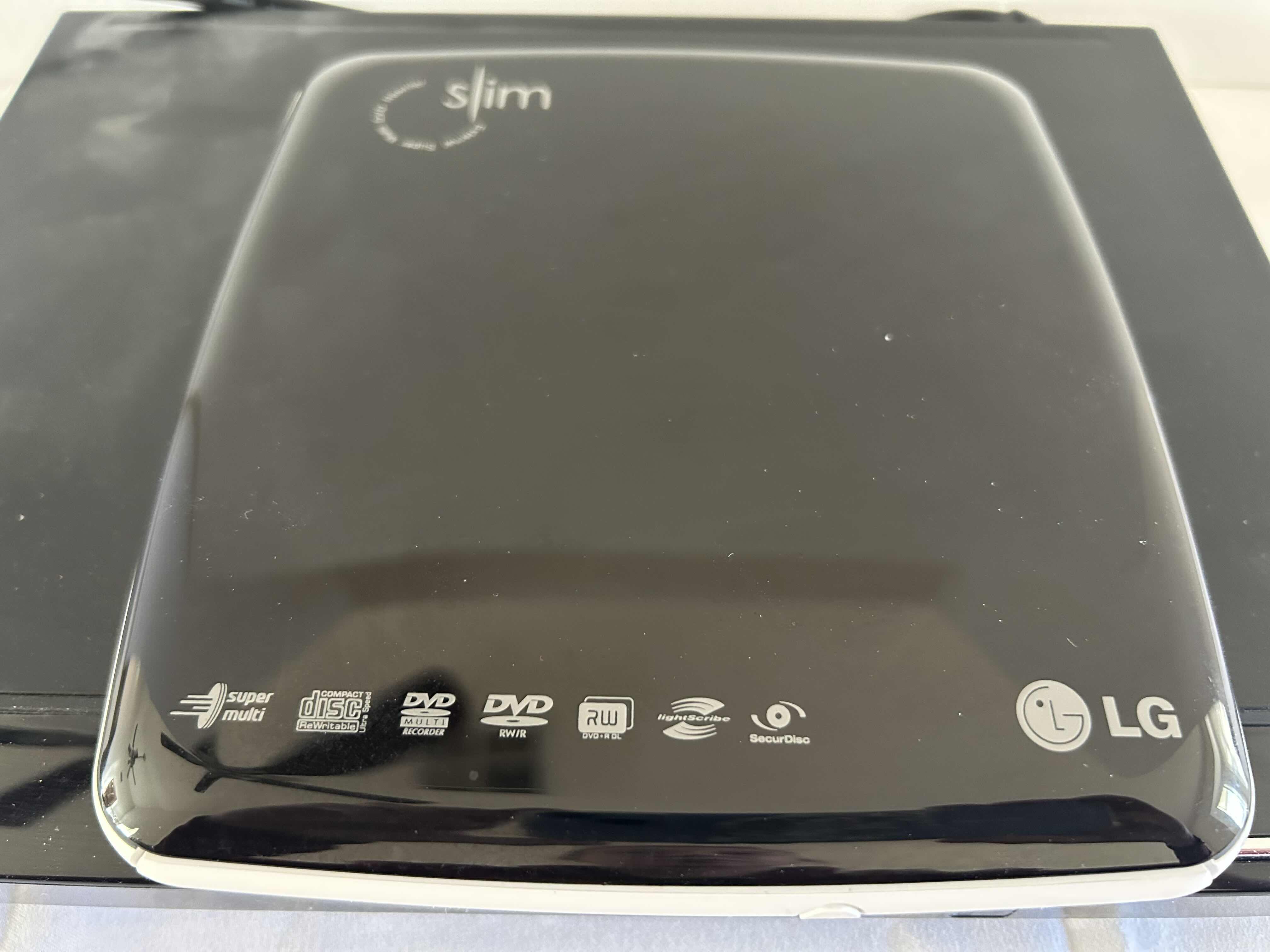 Photo 1 of 2- DVD PLAYERS- WITH REMOTE, LG  AND SONY WITH VARIOUS  DVD'S IN CASE.