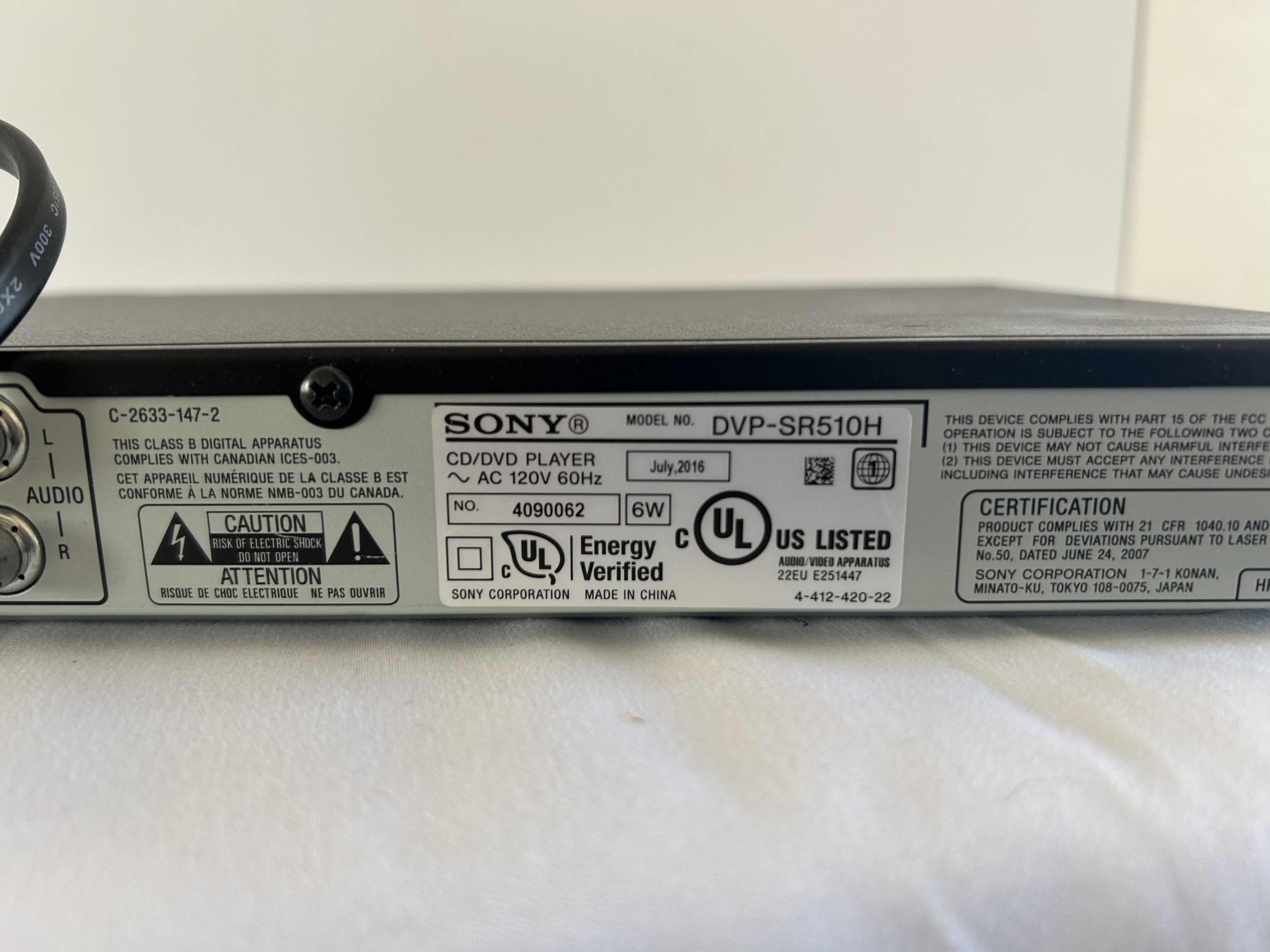 Photo 1 of 2- DVD PLAYERS- WITH REMOTE, LG  AND SONY WITH VARIOUS  DVD'S IN CASE.