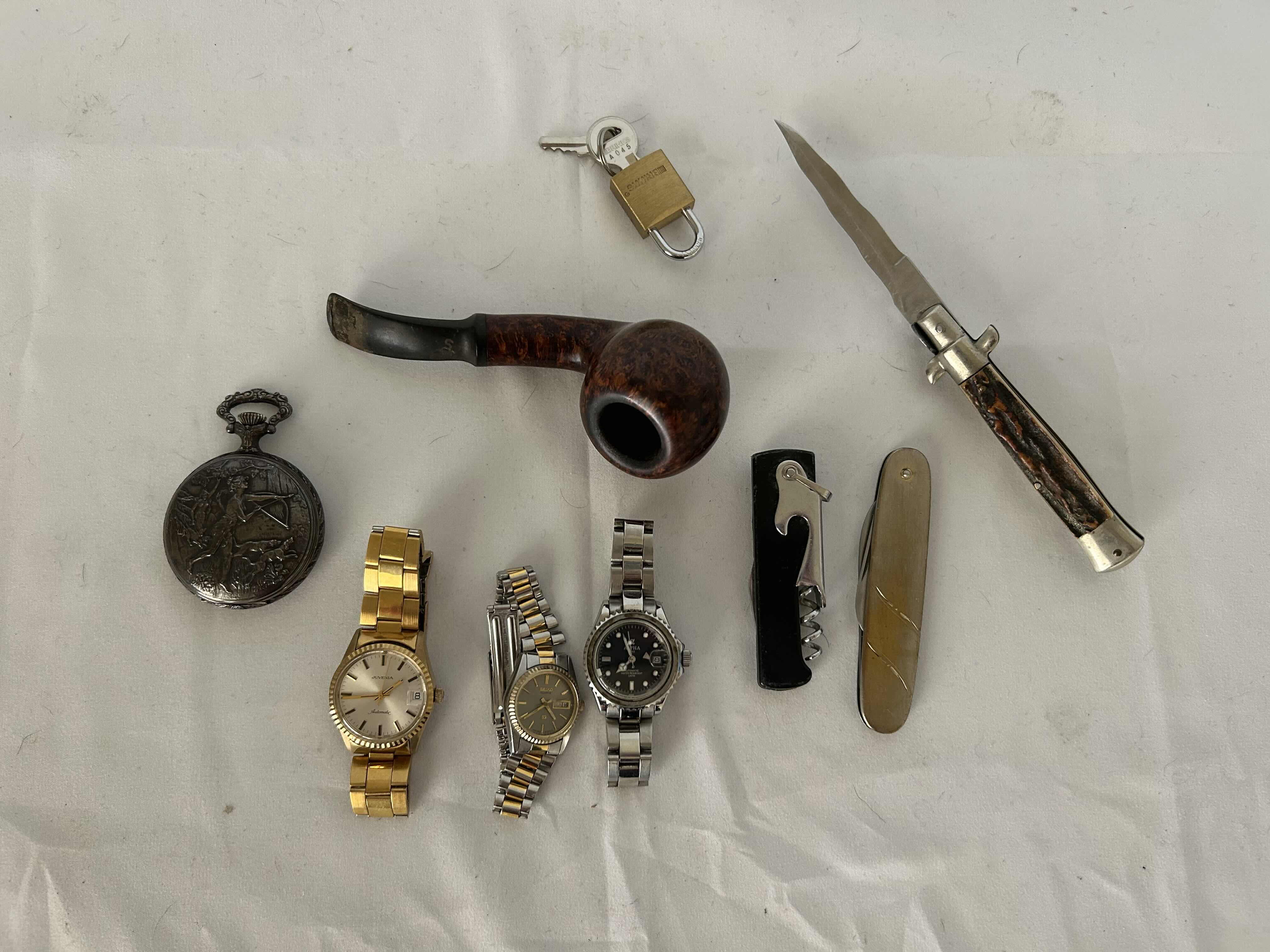 Photo 1 of BAG OF ASSORTED WATCHES, POCKET WATCH, VINTAGE TOBACCO PIPE, POCKET KNIFE, AND ONE 2" COLLECTORS KNIFE.