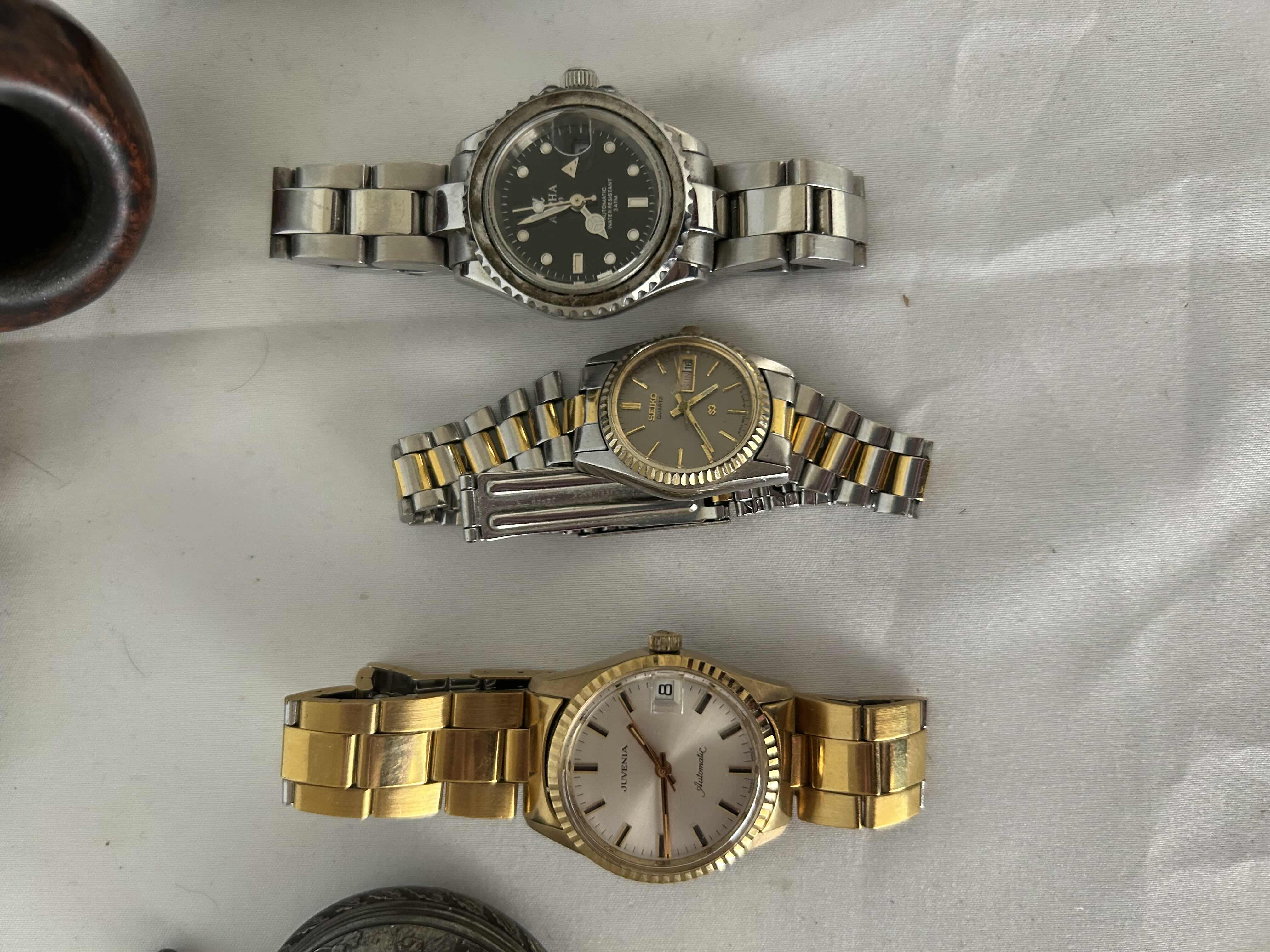 Photo 1 of BAG OF ASSORTED WATCHES, POCKET WATCH, VINTAGE TOBACCO PIPE, POCKET KNIFE, AND ONE 2" COLLECTORS KNIFE.