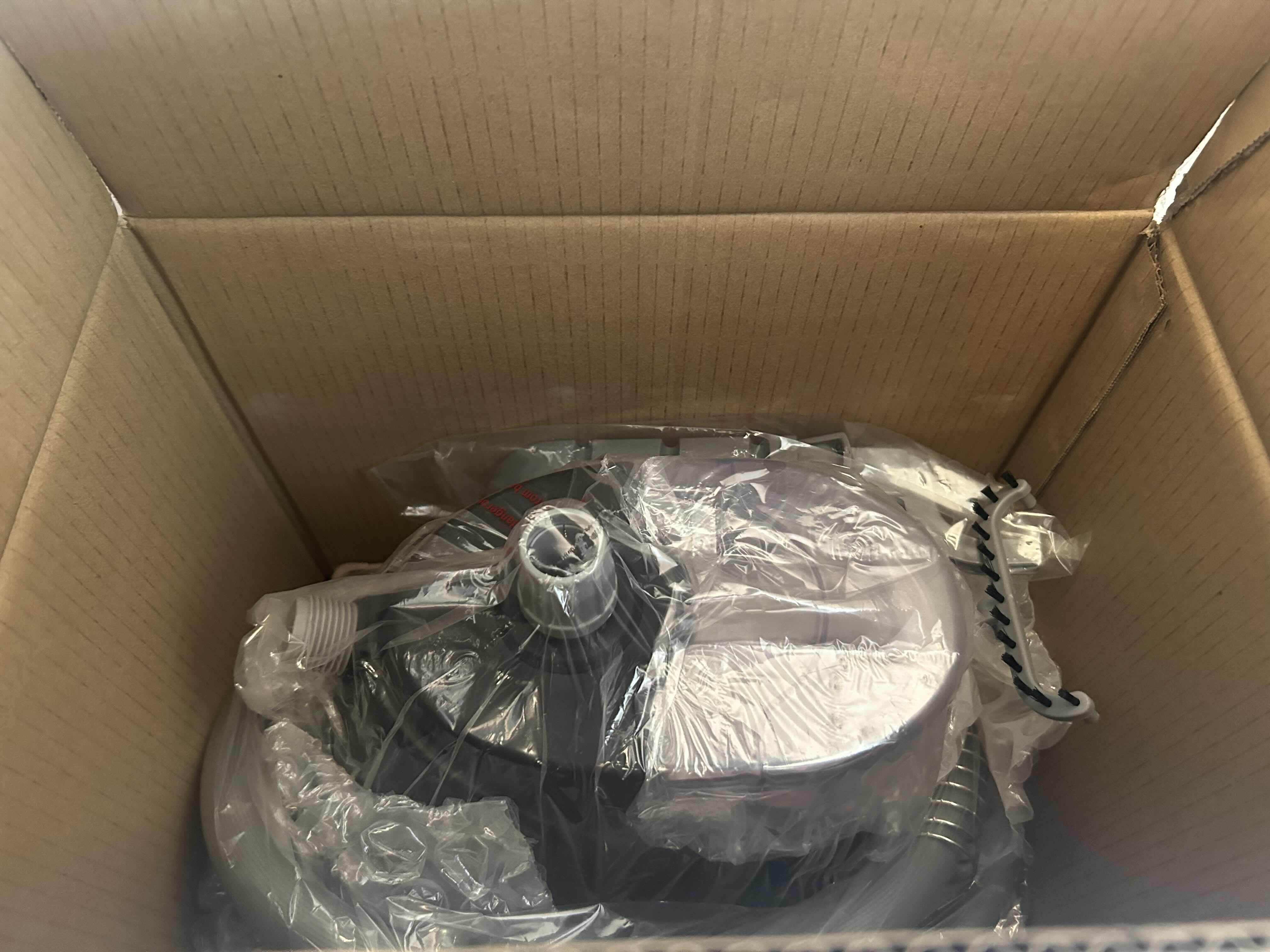 Photo 1 of BRAND NEW-STEAM & GO GARMENT STEAMER. MODEL SAG11