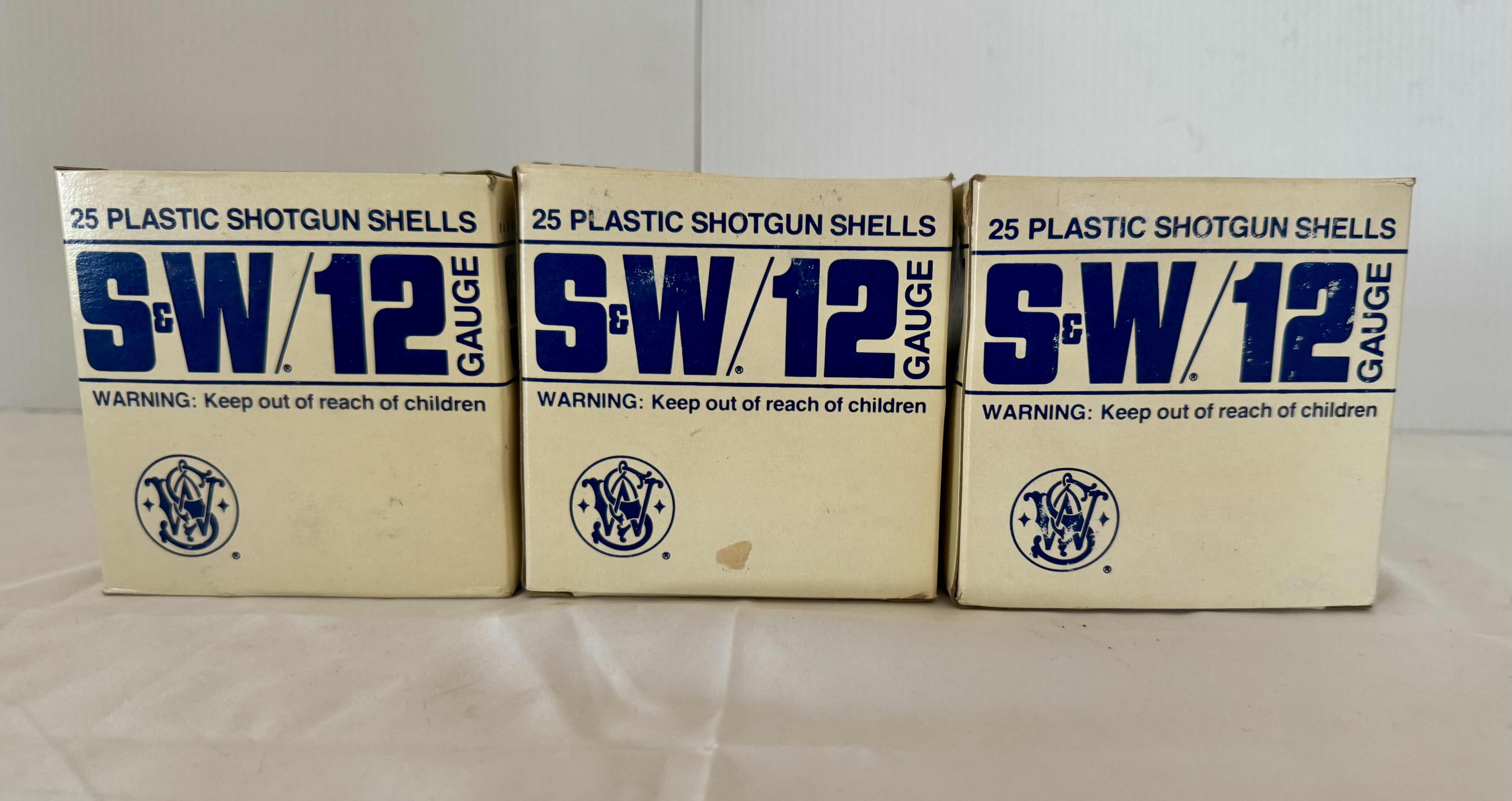 Photo 1 of 3 BOXES OF S&W 12 GAUGE 25 PLASTIC SHOTGUN SHELLS