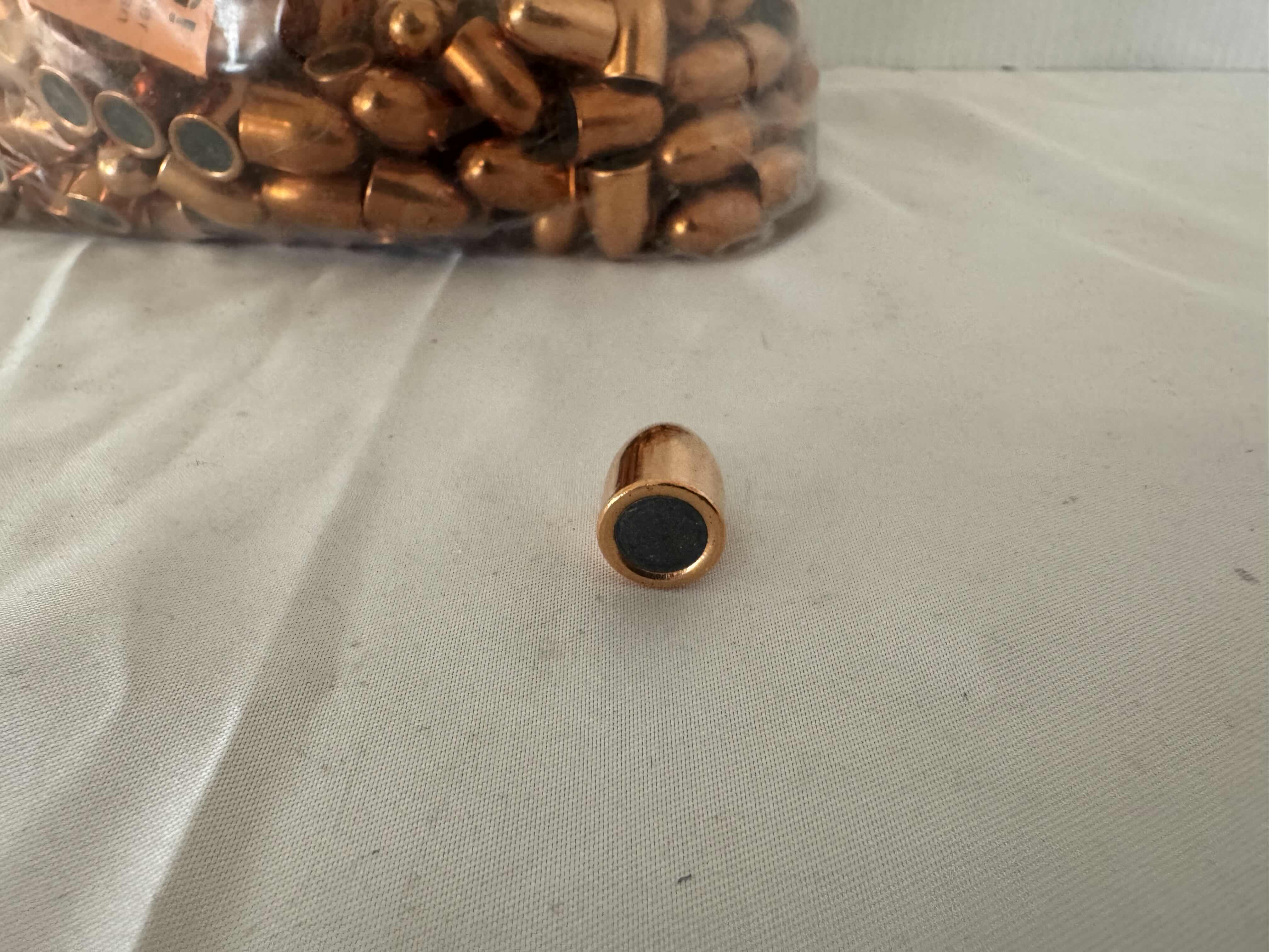 Photo 1 of BAG OF .45  95GRCOPPER PLATED BULLETS