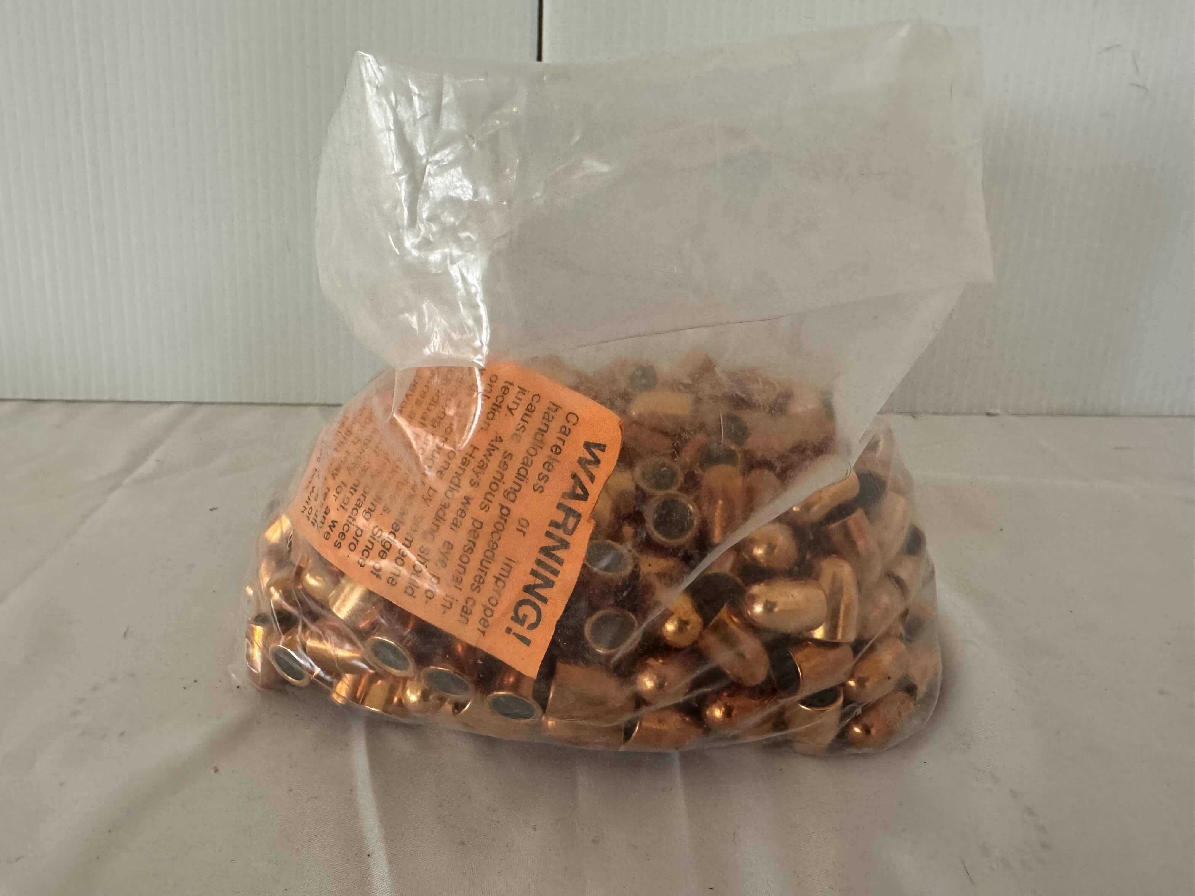 Photo 1 of BAG OF .45  95GRCOPPER PLATED BULLETS