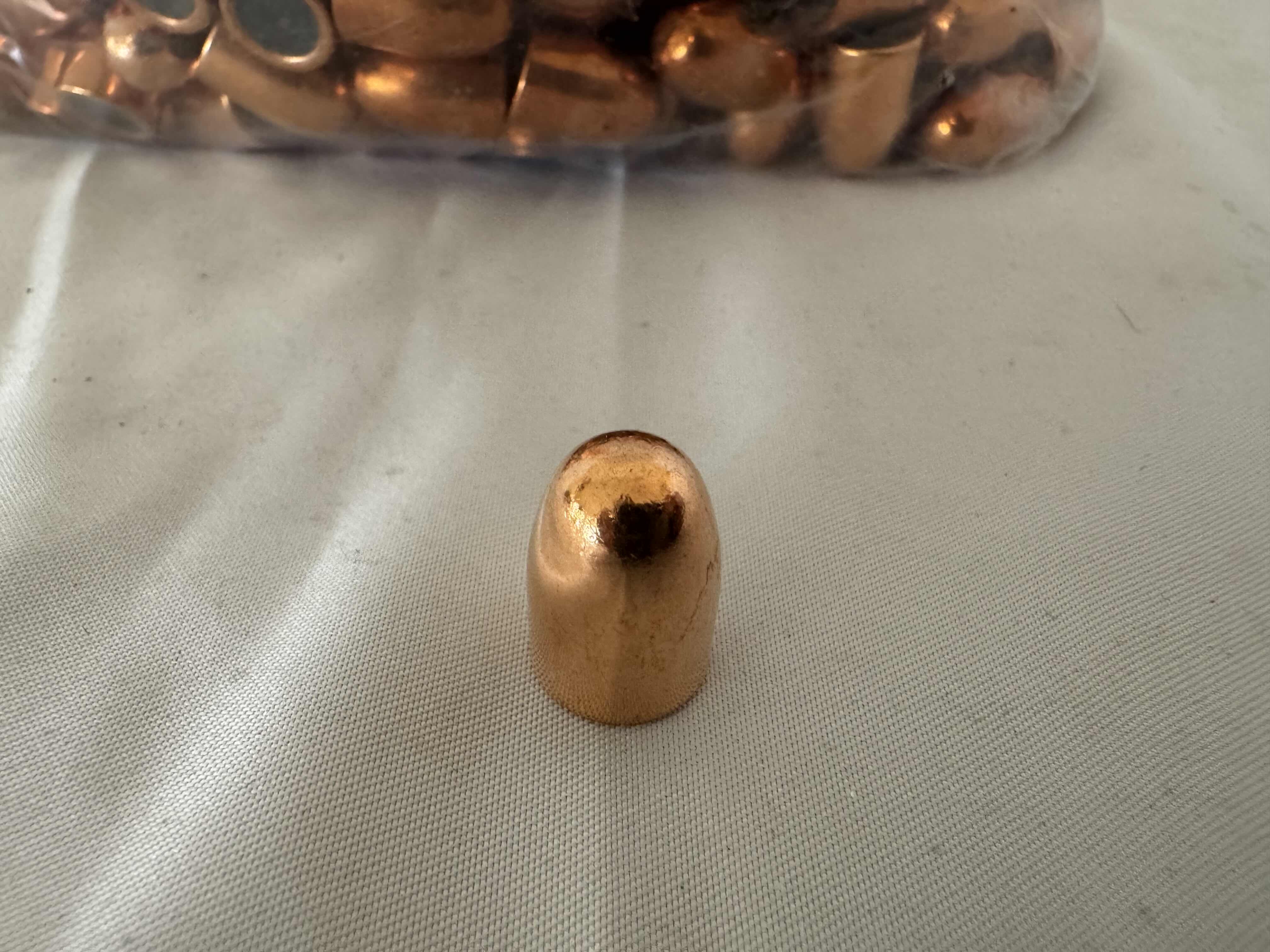 Photo 1 of BAG OF .45  95GRCOPPER PLATED BULLETS