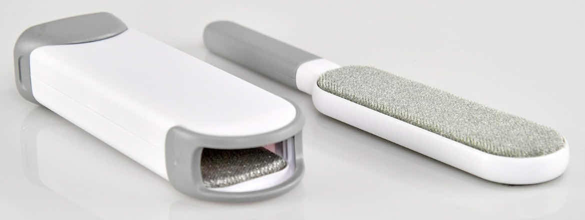 Photo 1 of 2- BRAND NEW HOME-X DOUBLE-SIDED LINT BRUSH WITH CLEANING BASE