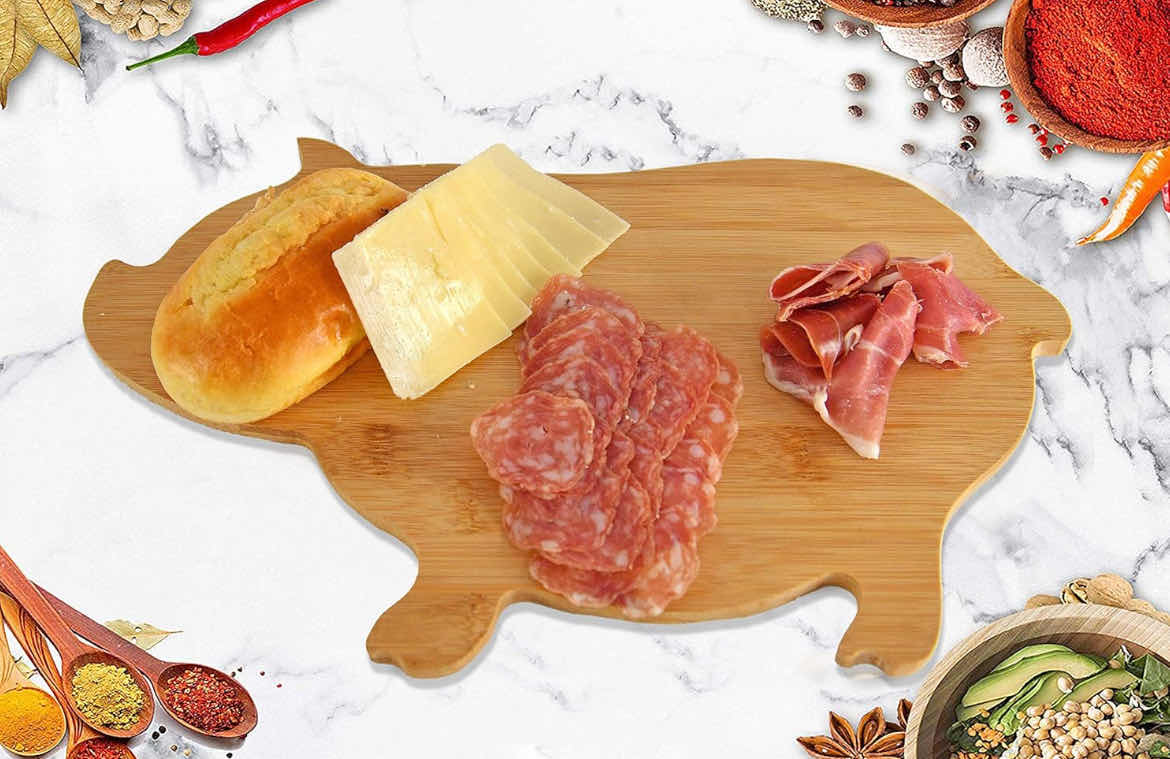 Photo 1 of CASE OF 24 HOME-X PIG-SHAPED BAMBOO REVERSIBLE CUTTING BOARD AND SERVING TRAY, CHEESE BOARD, KITCHEN TRAY, OR FRUIT PLATTER-NATURAL COLOR-15 5/8" X 9 1/2" X 5/8"