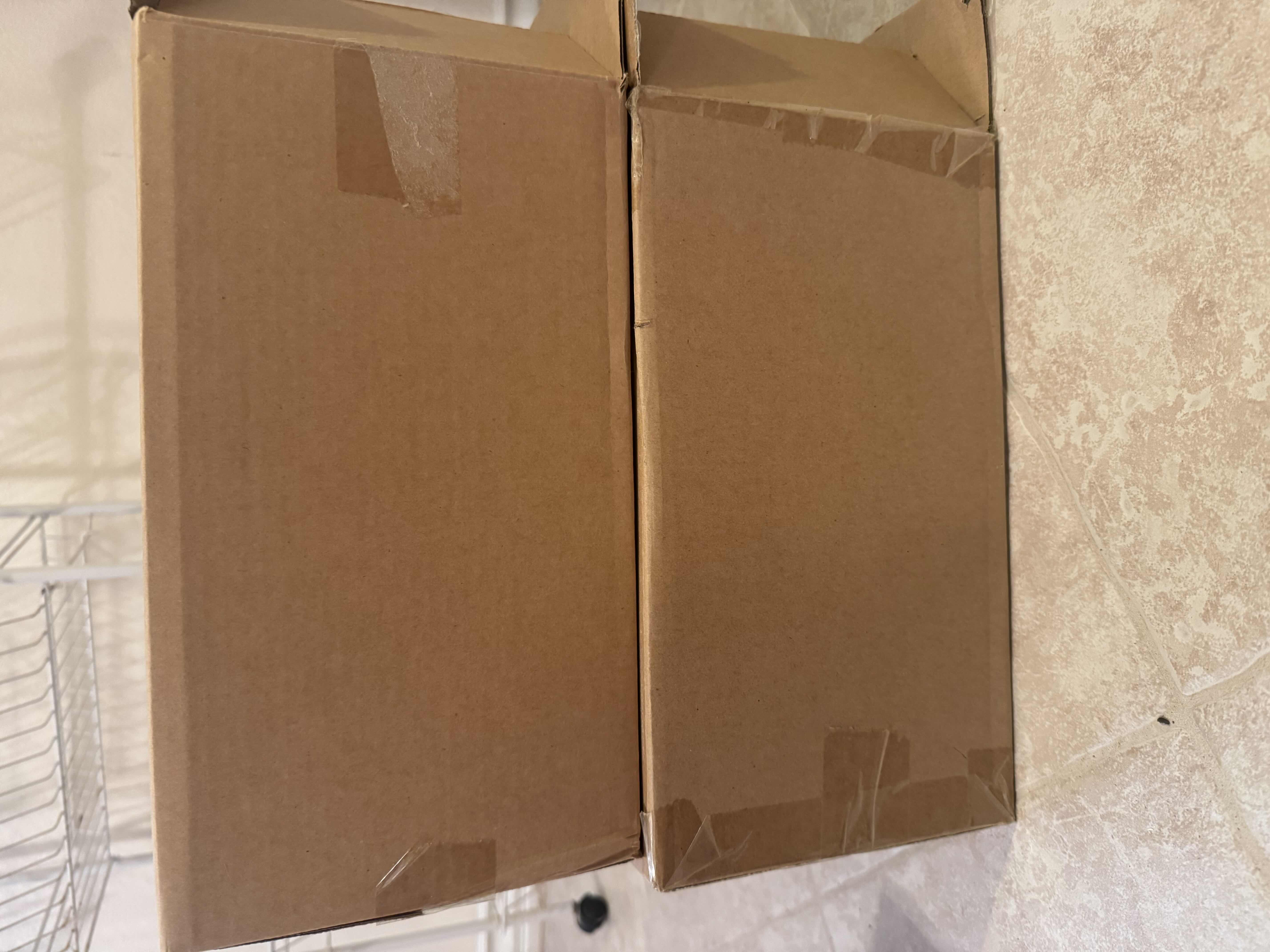 Photo 1 of 2 BRAND NEW FRUIT BASKET STORAGE UNITS, BOTH BLACK AND METAL, ONE IS SQUARE & ONE IS ROUND. NEEDS ASSEMBLED