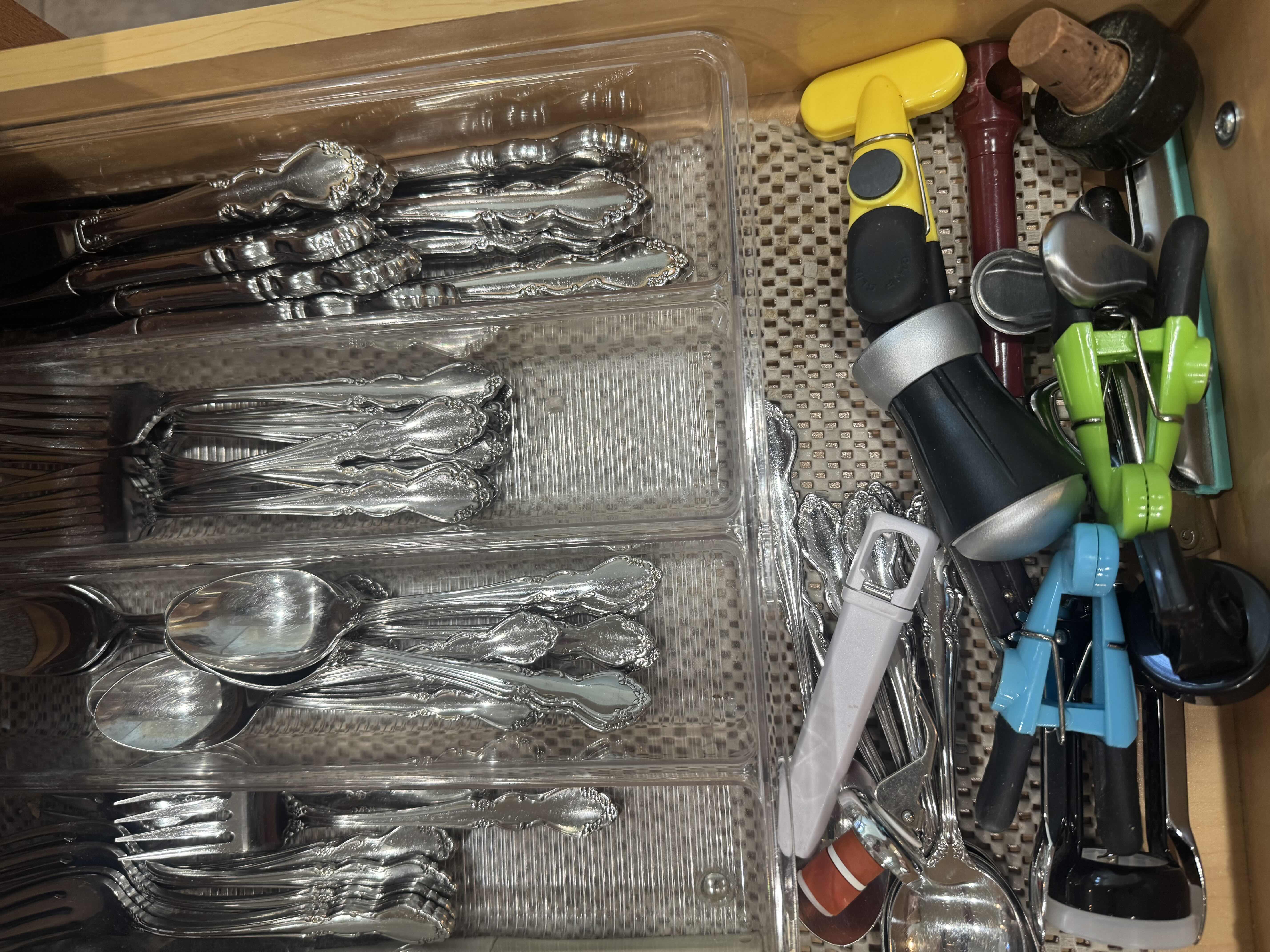 Photo 1 of CONTENTS OF DRAWER: SILVERWARE, WINE OPENER, BAG CLIPS