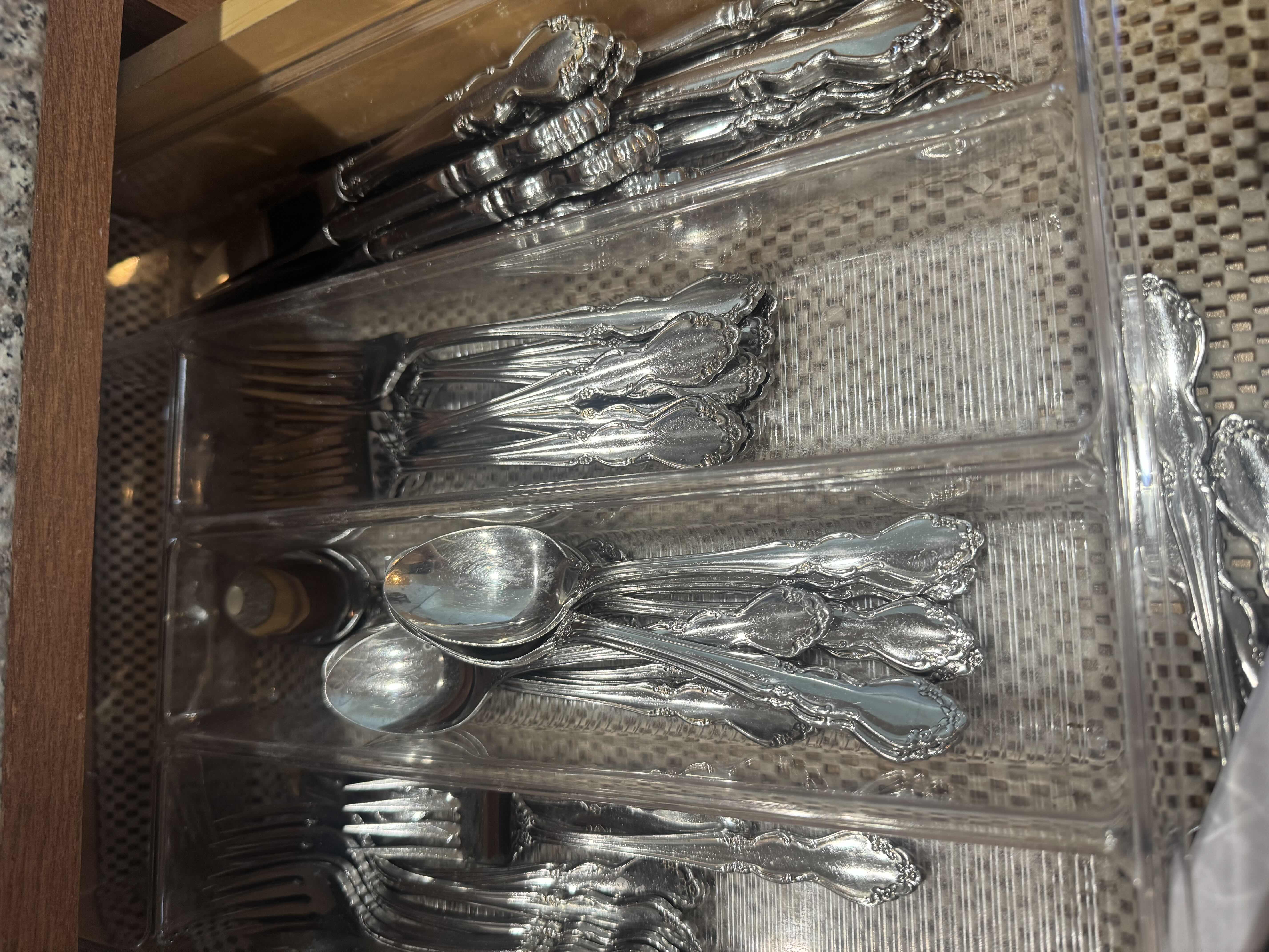 Photo 1 of CONTENTS OF DRAWER: SILVERWARE, WINE OPENER, BAG CLIPS