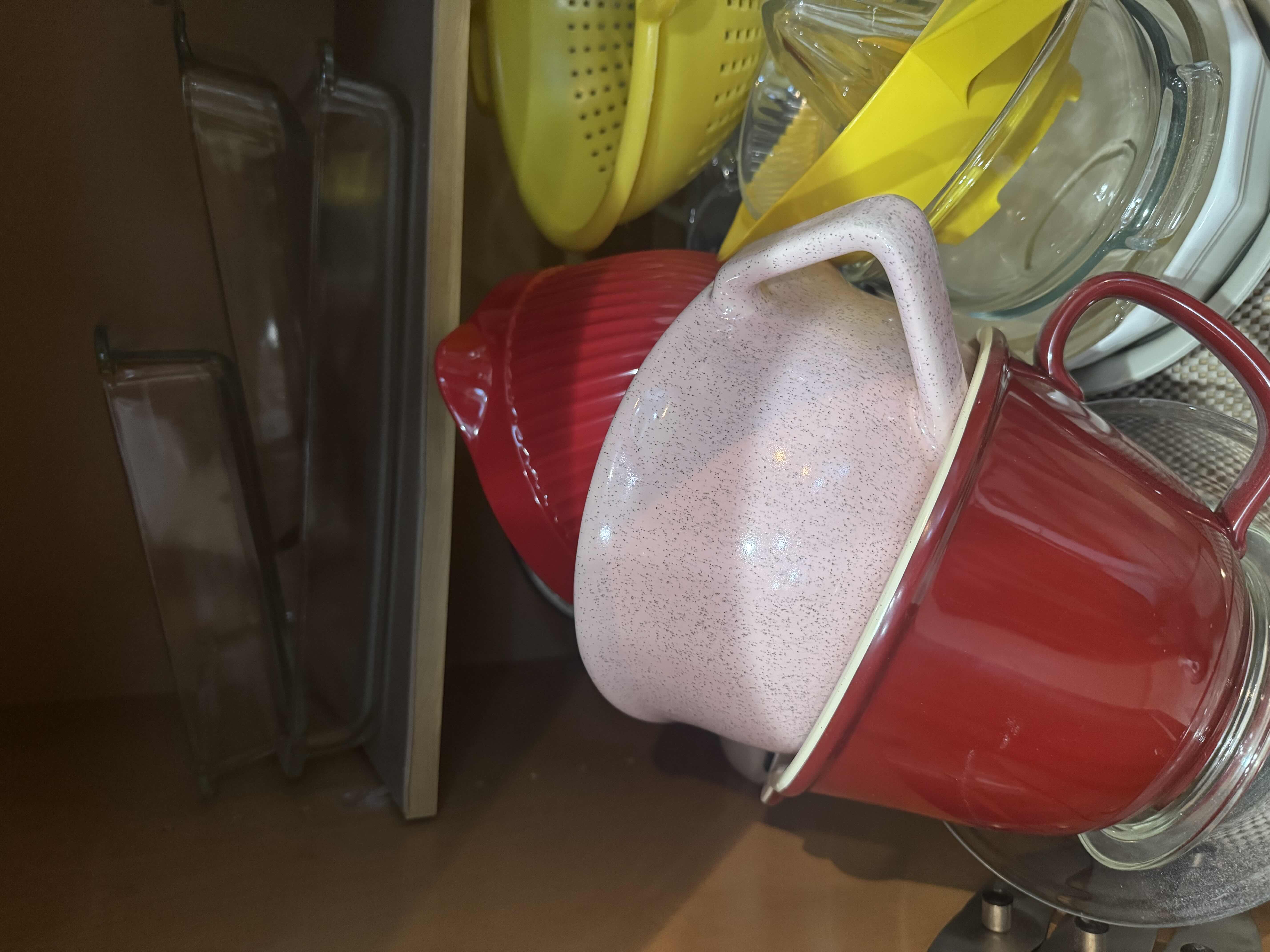 Photo 1 of CONTENTS OF CABINET: MIXING BOWLS, MEASURING CUPS, COLANDER,SALAD SPINNER