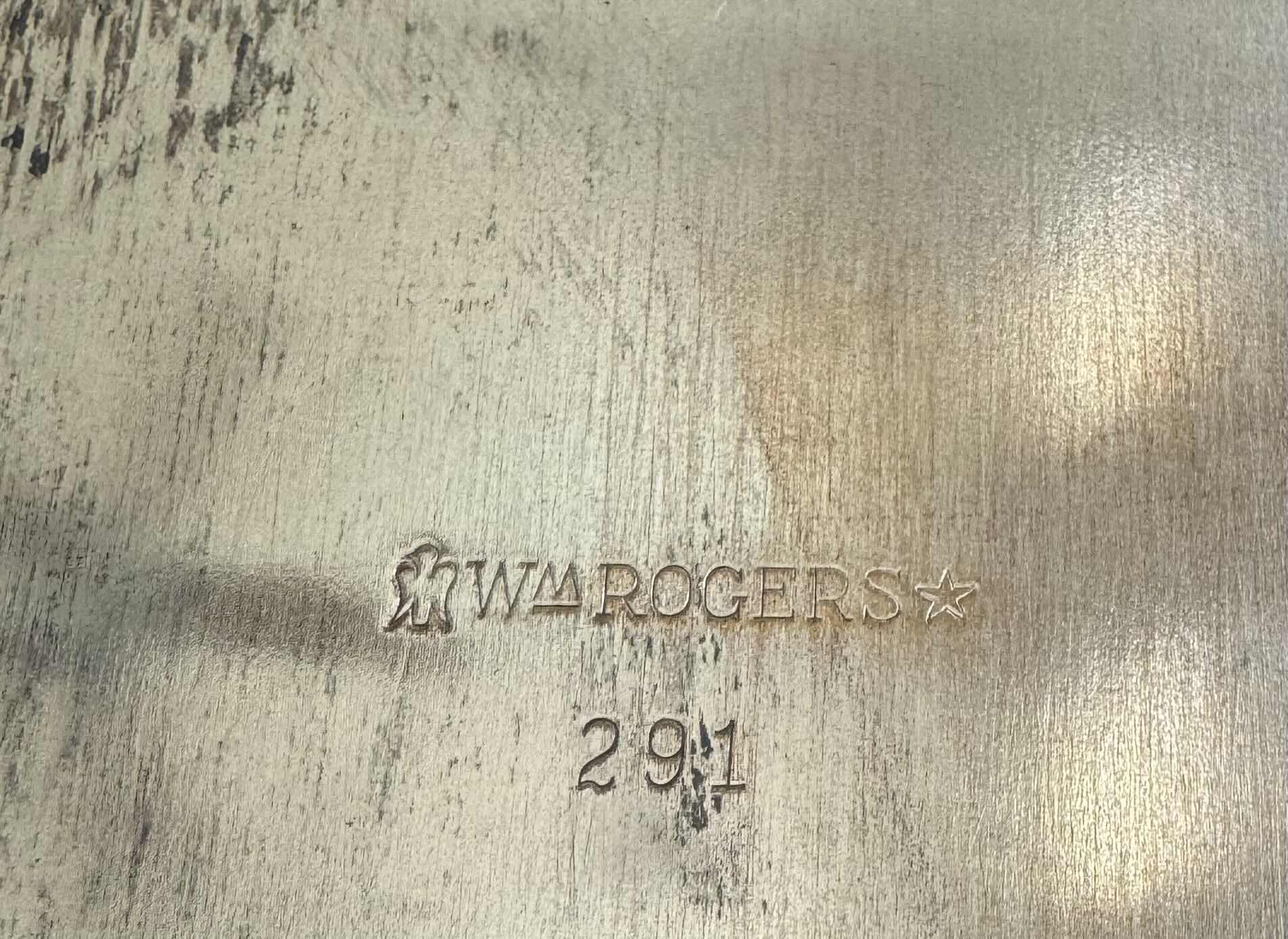 Photo 1 of 150
VINTAGE ANTIQUE WM ROGERS 291 SERVING TRAY SILVER PLATTER. 

27” X 15.5” X H1.75”