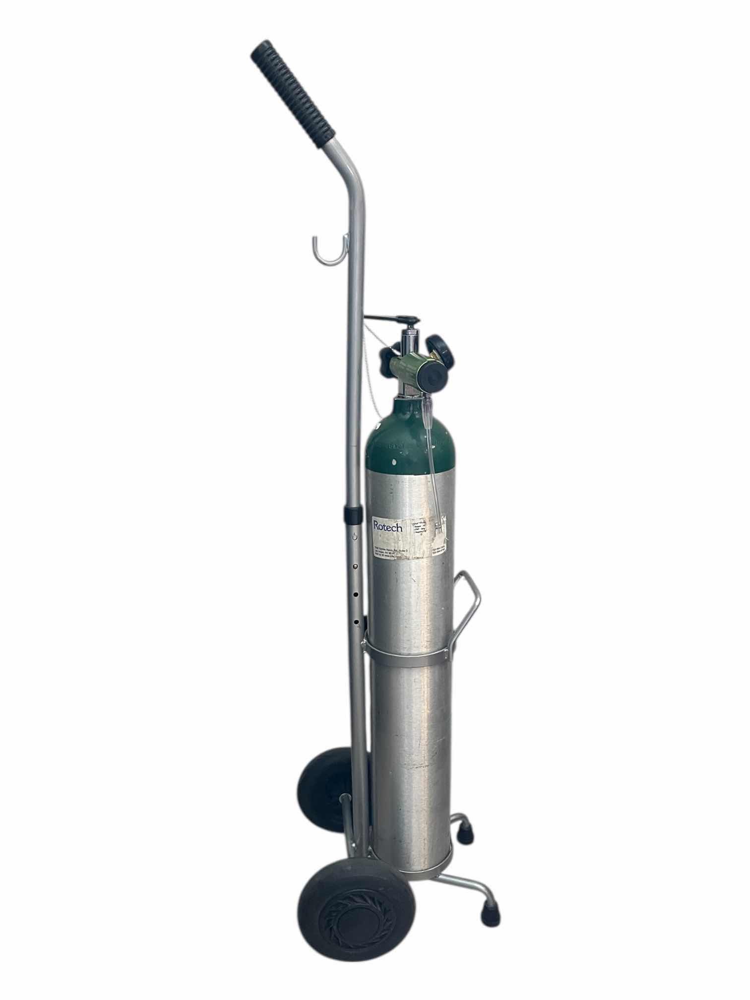 Photo 1 of OXYGEN COMPRESSED USBUN1072 MEDICAL GAS TANK W PRESSURE GAUGE & ROLLING CART 4.5” X 29”