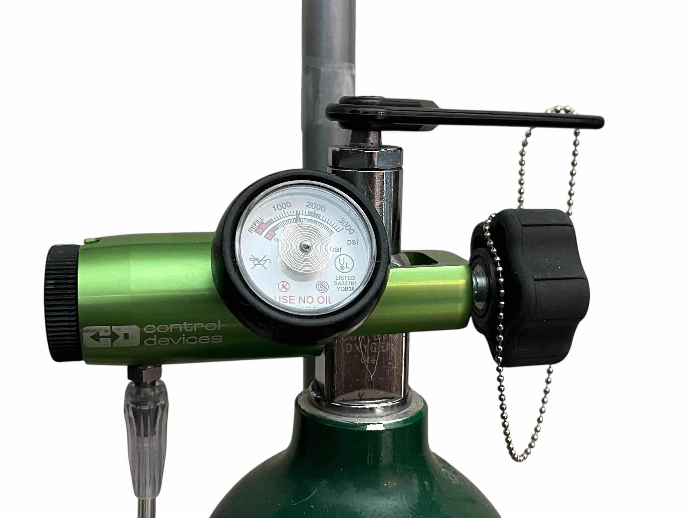 Photo 1 of OXYGEN COMPRESSED USBUN1072 MEDICAL GAS TANK W PRESSURE GAUGE & ROLLING CART 4.5” X 29”