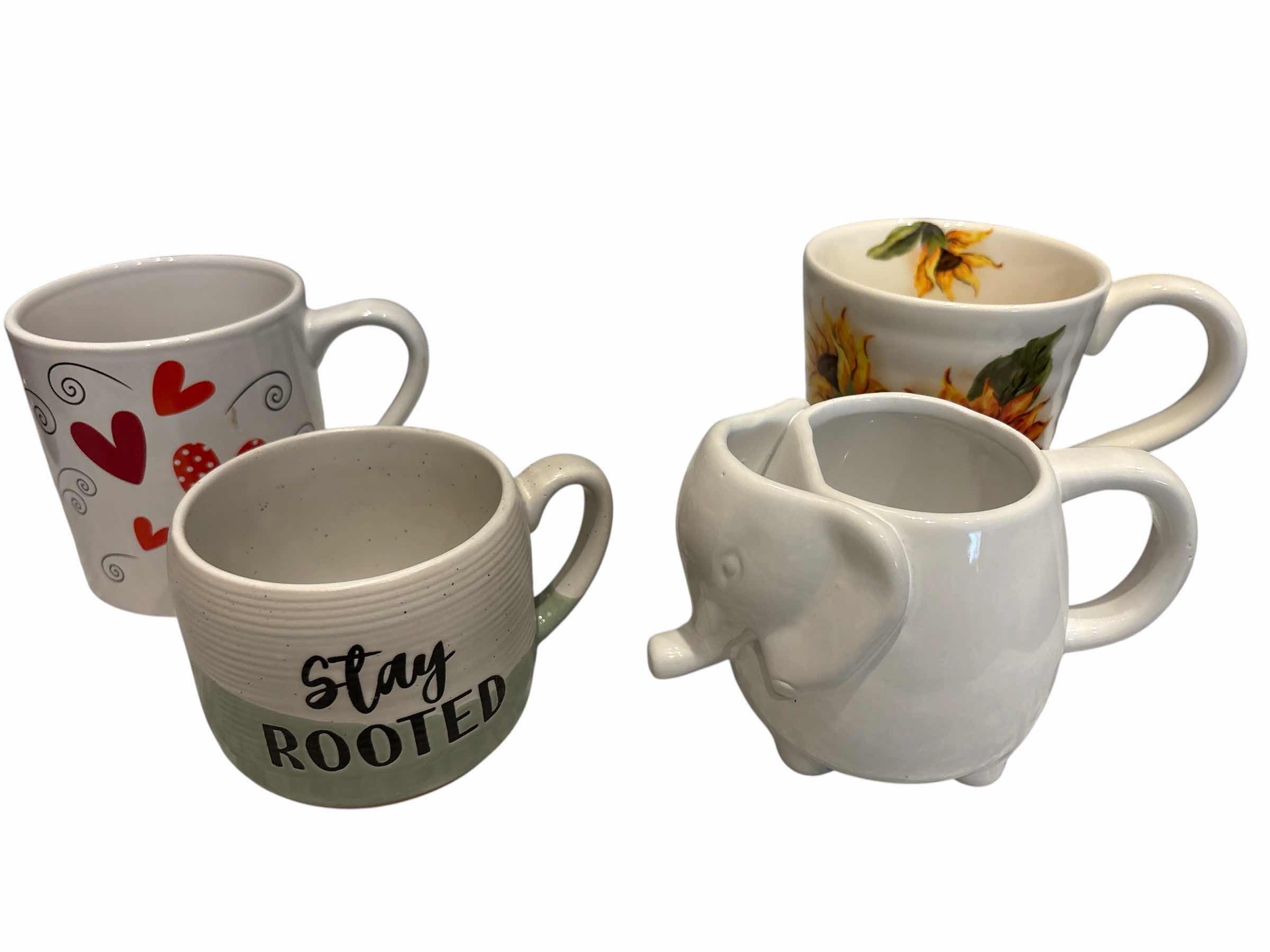 Photo 1 of COFFEE MUGS (4)