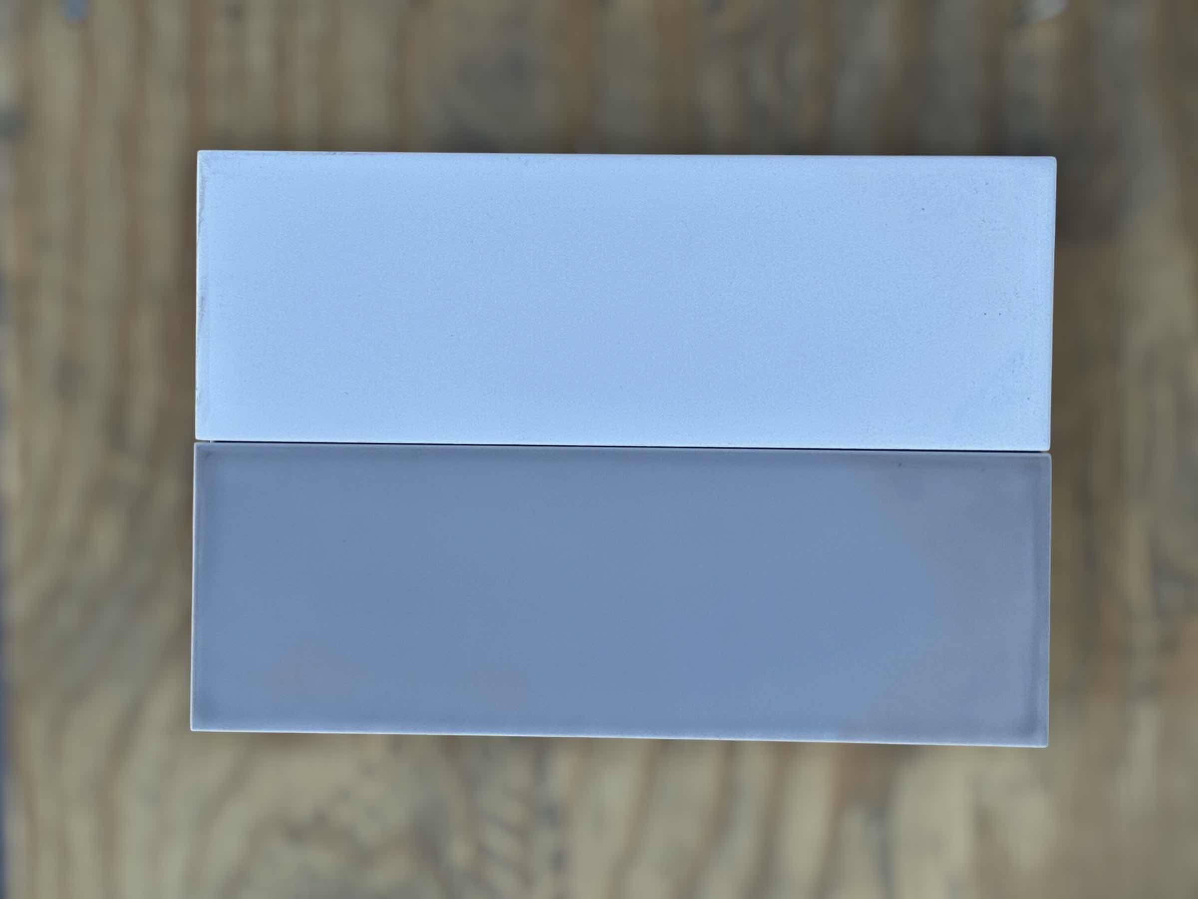 Photo 1 of FIANDRE GLACIER WHITE FINISH TILE 10” X 30” (34PCS PER CASE/3 CASES) & FIANDRE FUME GRAY FINISH TILE 10” X 30” (34PCS PER CASE/9 CASES) READ NOTES