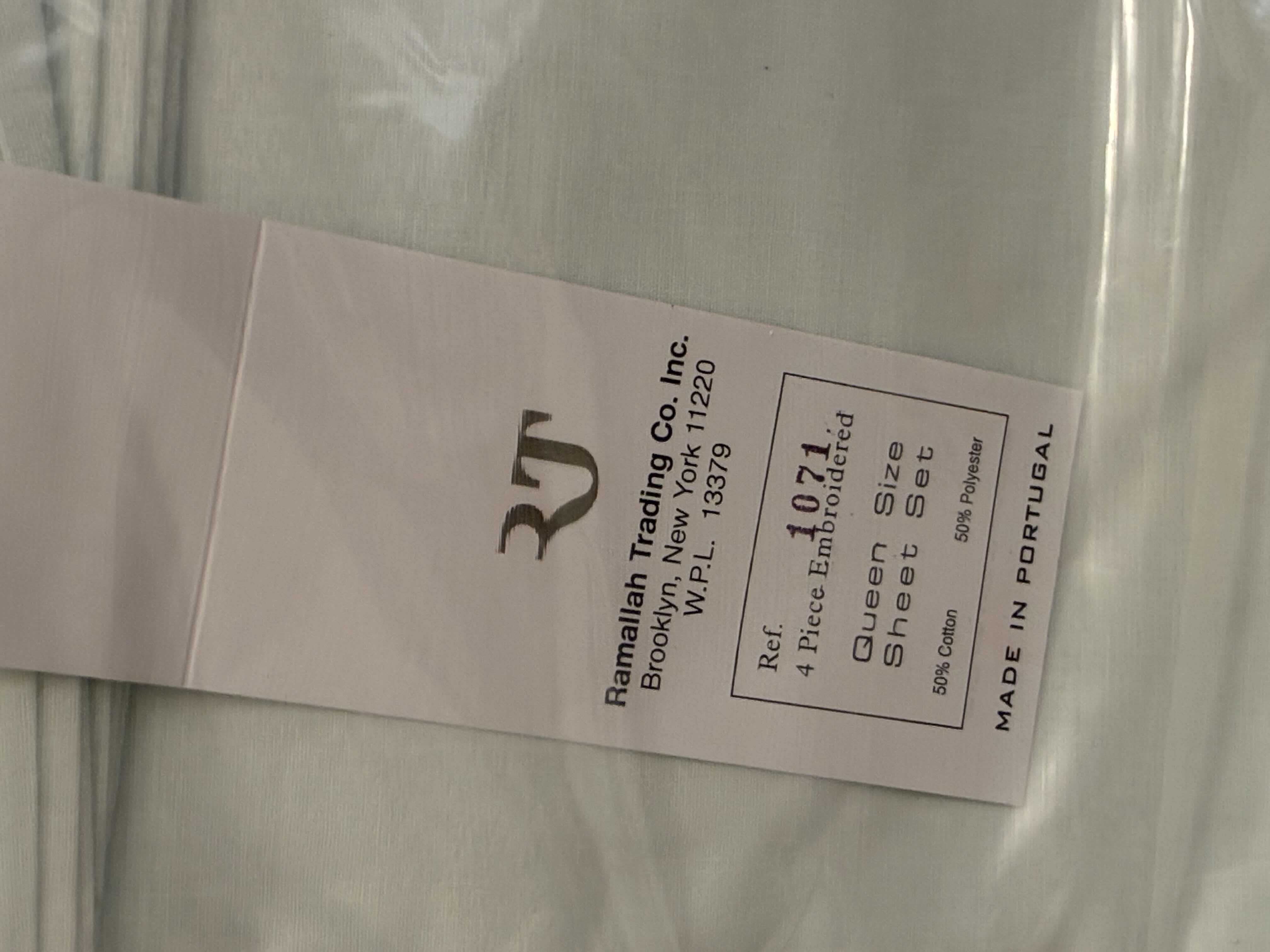 Photo 1 of RAMALLAH TRADING CO. TEAL 4PC QUEEN SIZE EMBROIDERED SHEET SET.