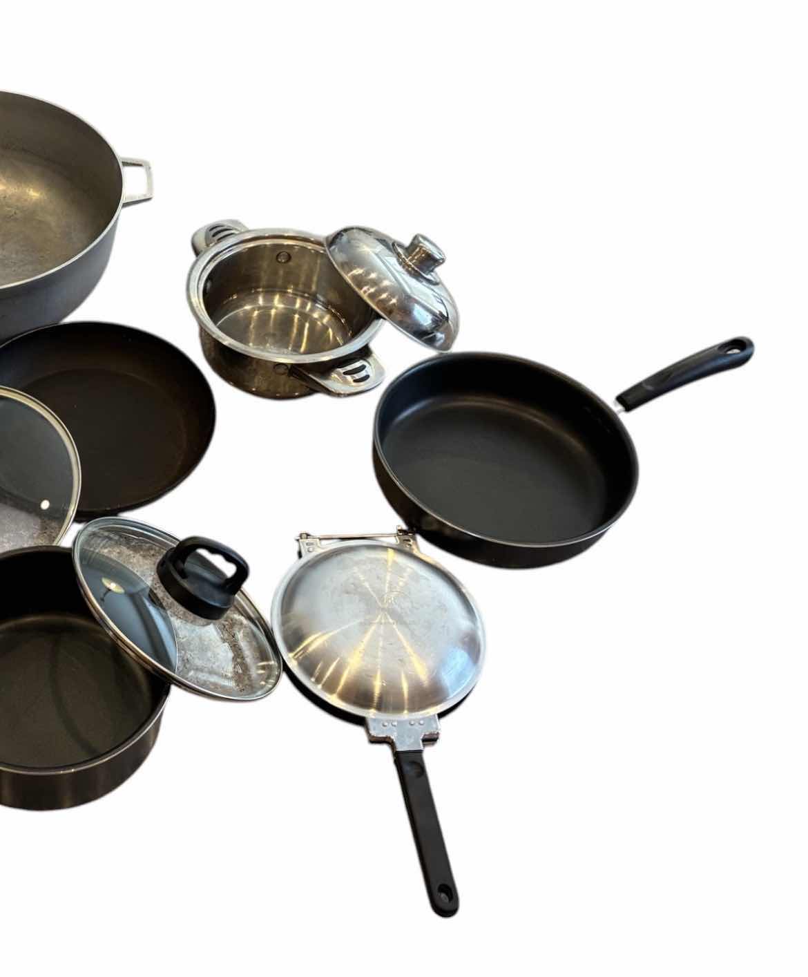 Photo 1 of COOKING POT & PAN SET W LIDS (7)
