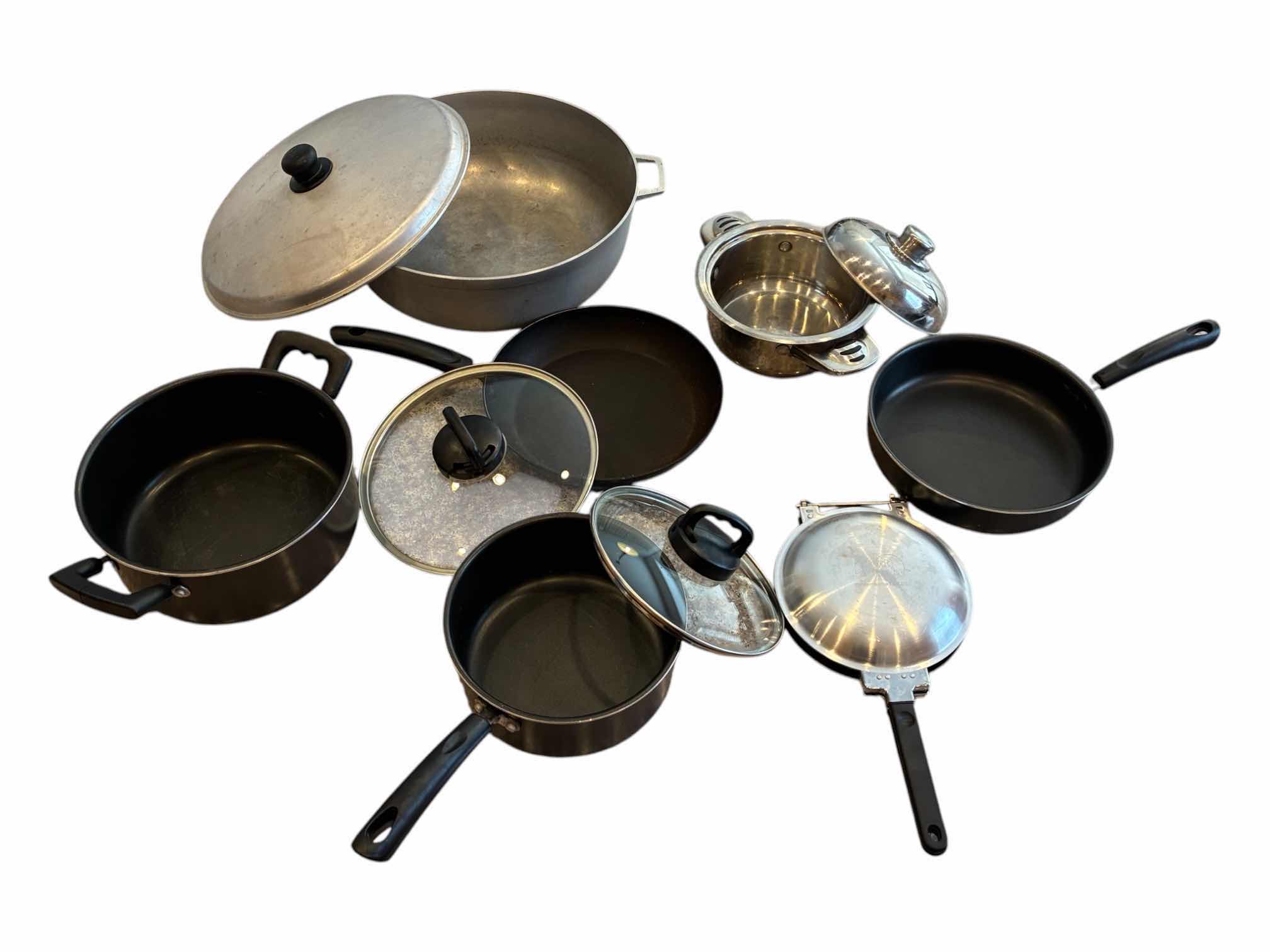 Photo 1 of COOKING POT & PAN SET W LIDS (7)
