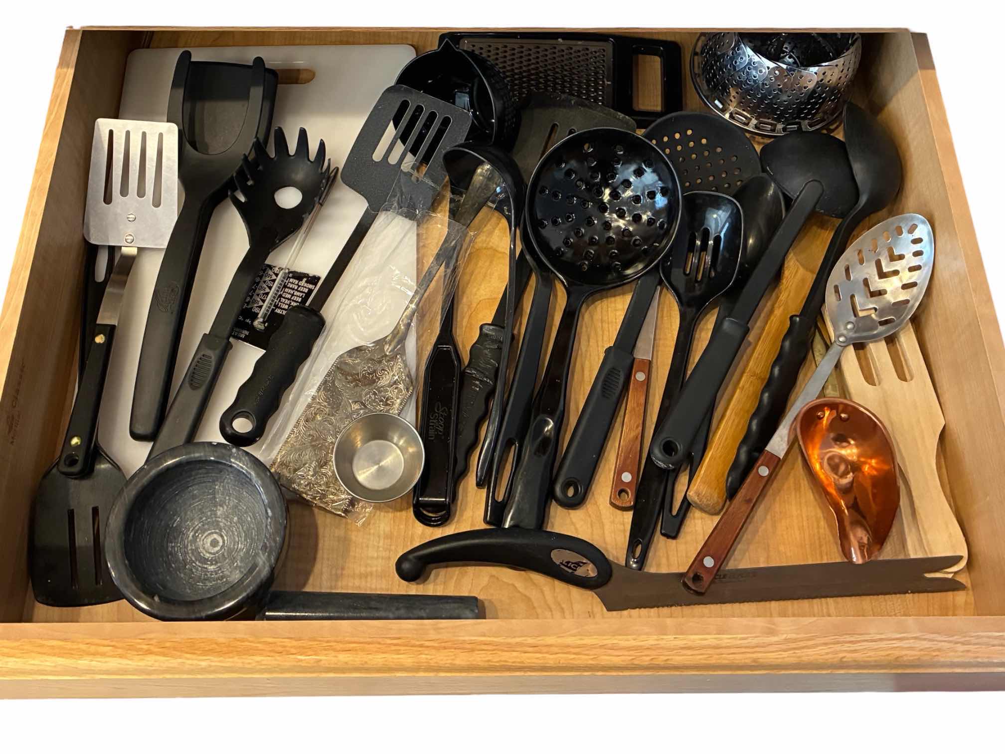 Photo 1 of CONTENTS OF DRAWER -KITCHEN UTENSILS & CUTLERY W CUTTING BOARD