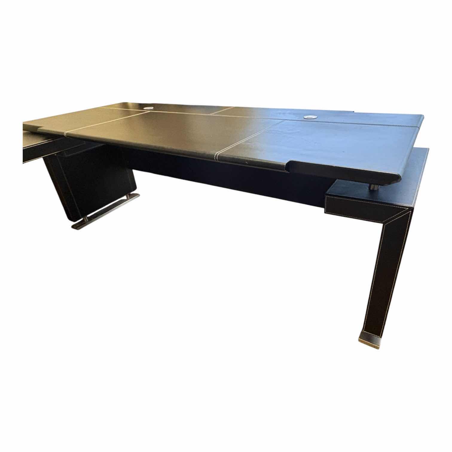 View 2 of L SHAPED EXECUTIVE BLACK DESK W WHITE STITCHING 77”X30”H29” LARGE SECTION, OTHER SECTION 63.5”X17”H29”
