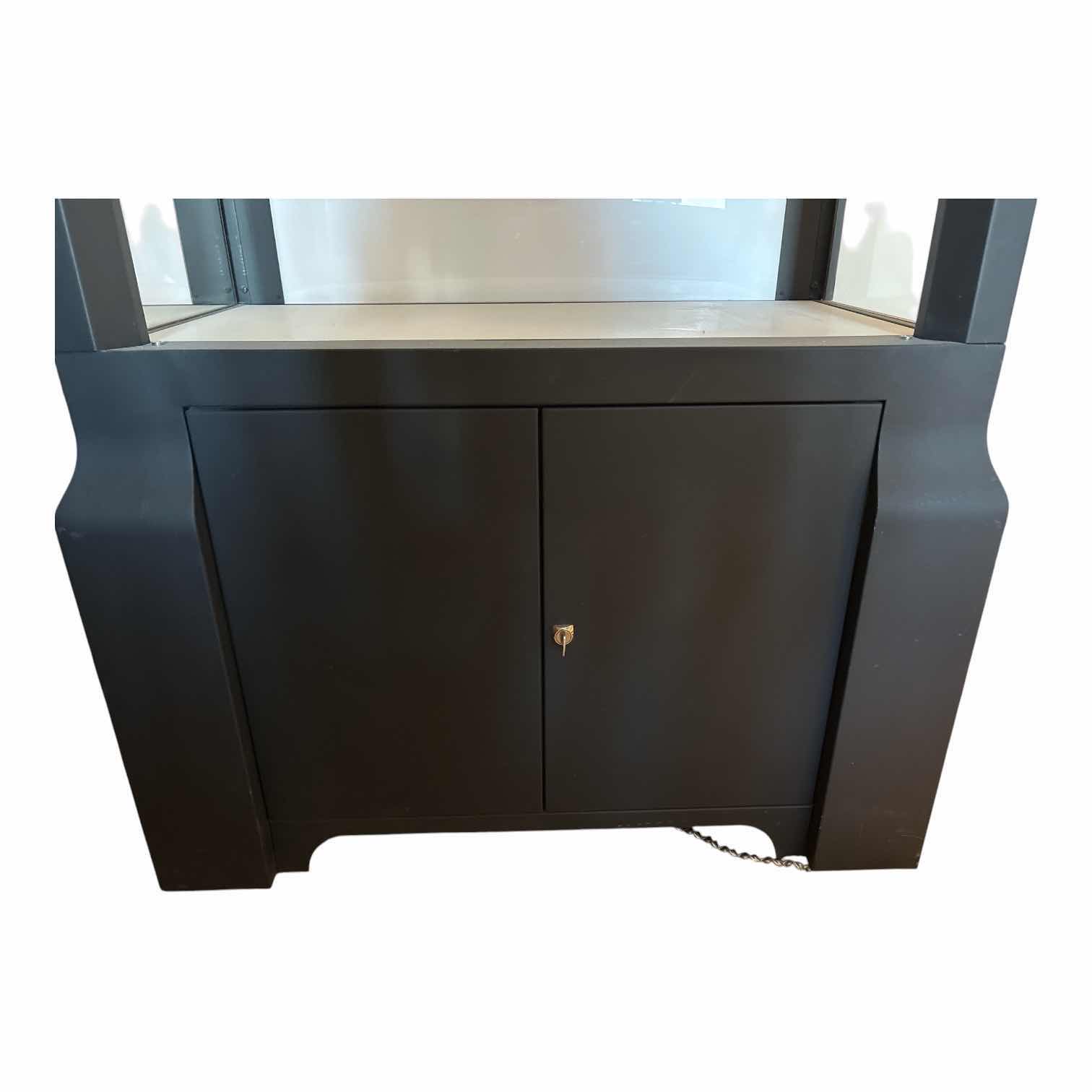 Photo 1 of OAKLEYMEGA TOWER 3.0 METAL DISPLAY CASE W/4- GLASS SHELVES COMES WITH KEY
33.5”X19”H72.5” $2900