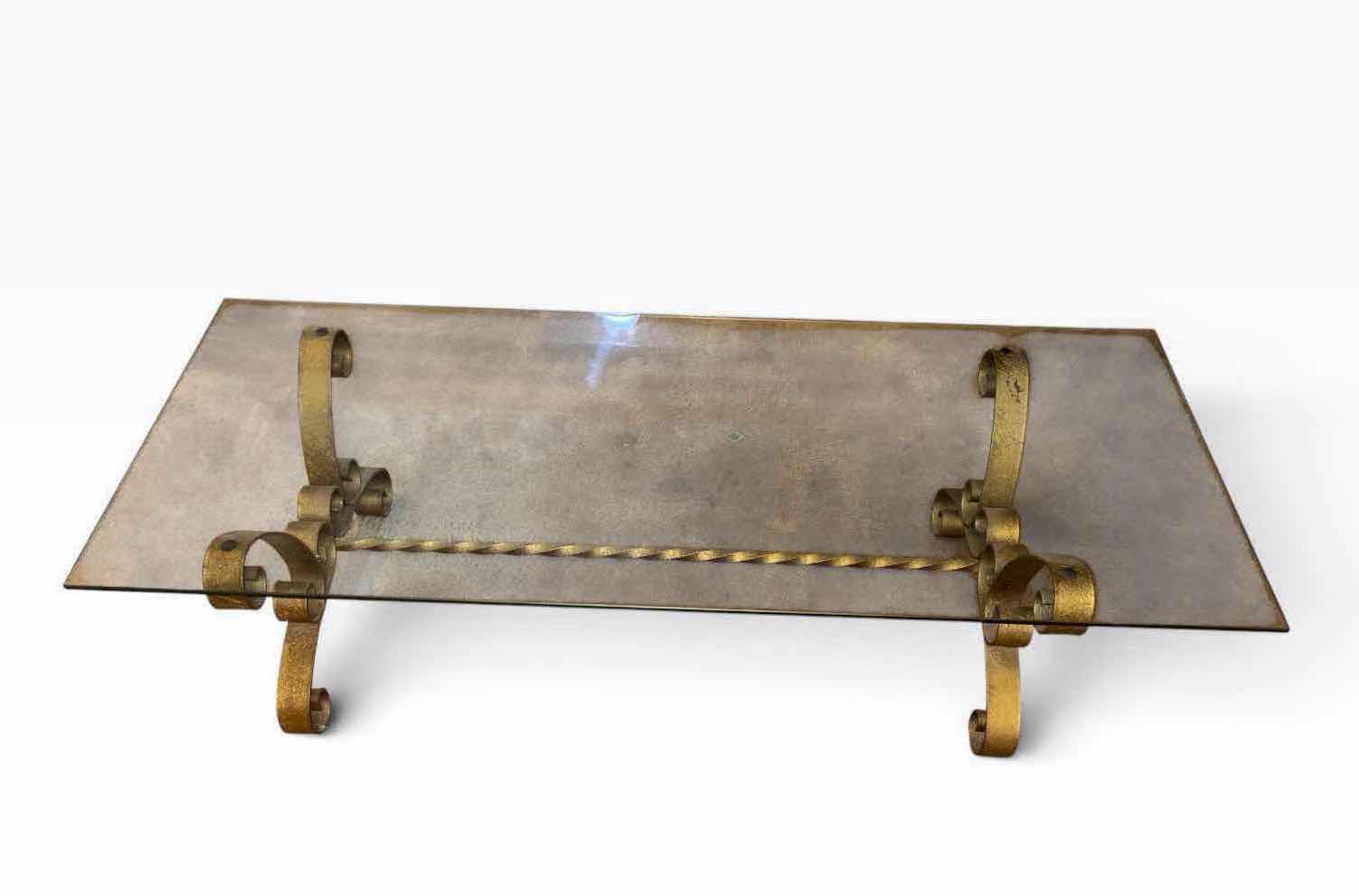 Photo 1 of MID CENTURY MODERN GILT WROUGHT IRON SCROLL HOLLYWOOD REGENCY GLASS TOP COFFEE TABLE IN GOLD FINISH 23.75” X 57.75” H15.25”