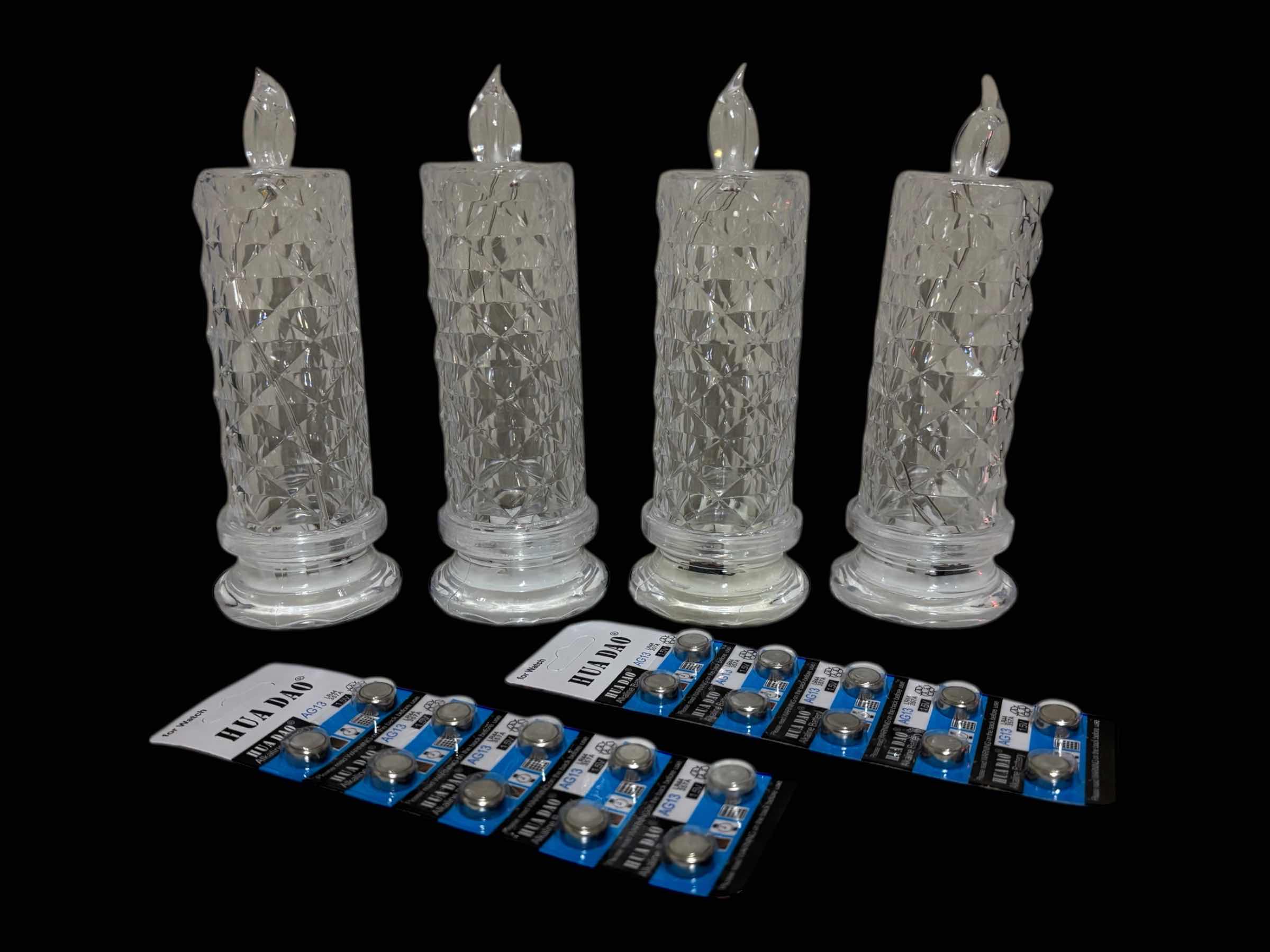 Photo 1 of FLAMELESS LED CRYSTAL STYLE PLASTIC CANDLE SET OF 4 W BATTERIES
