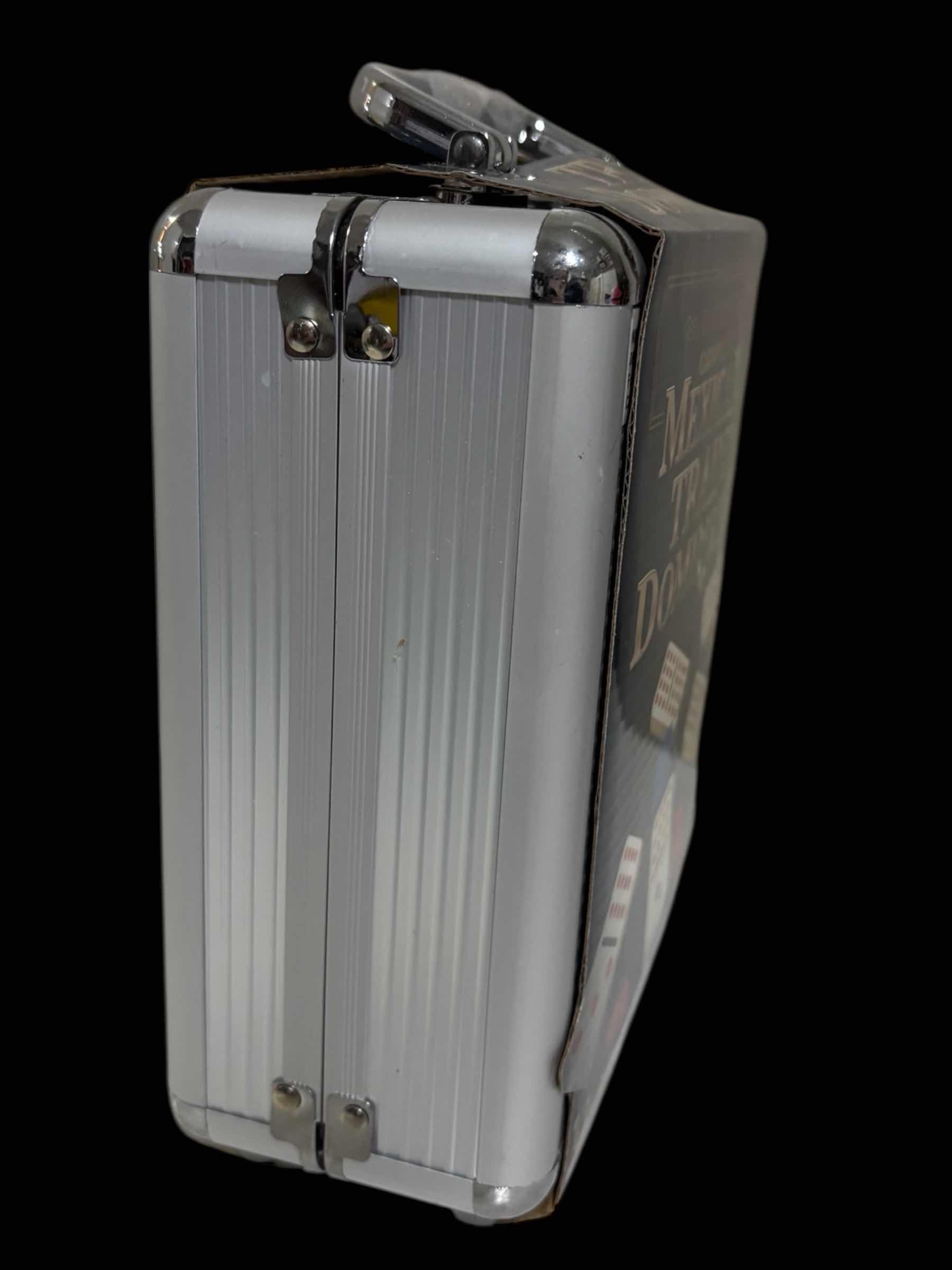 Photo 1 of SPIN MASTER GAMES MEXICAN TRAIN DOMINOES SET TILE BOARD GAME IN ALUMINUM CARRY CASE