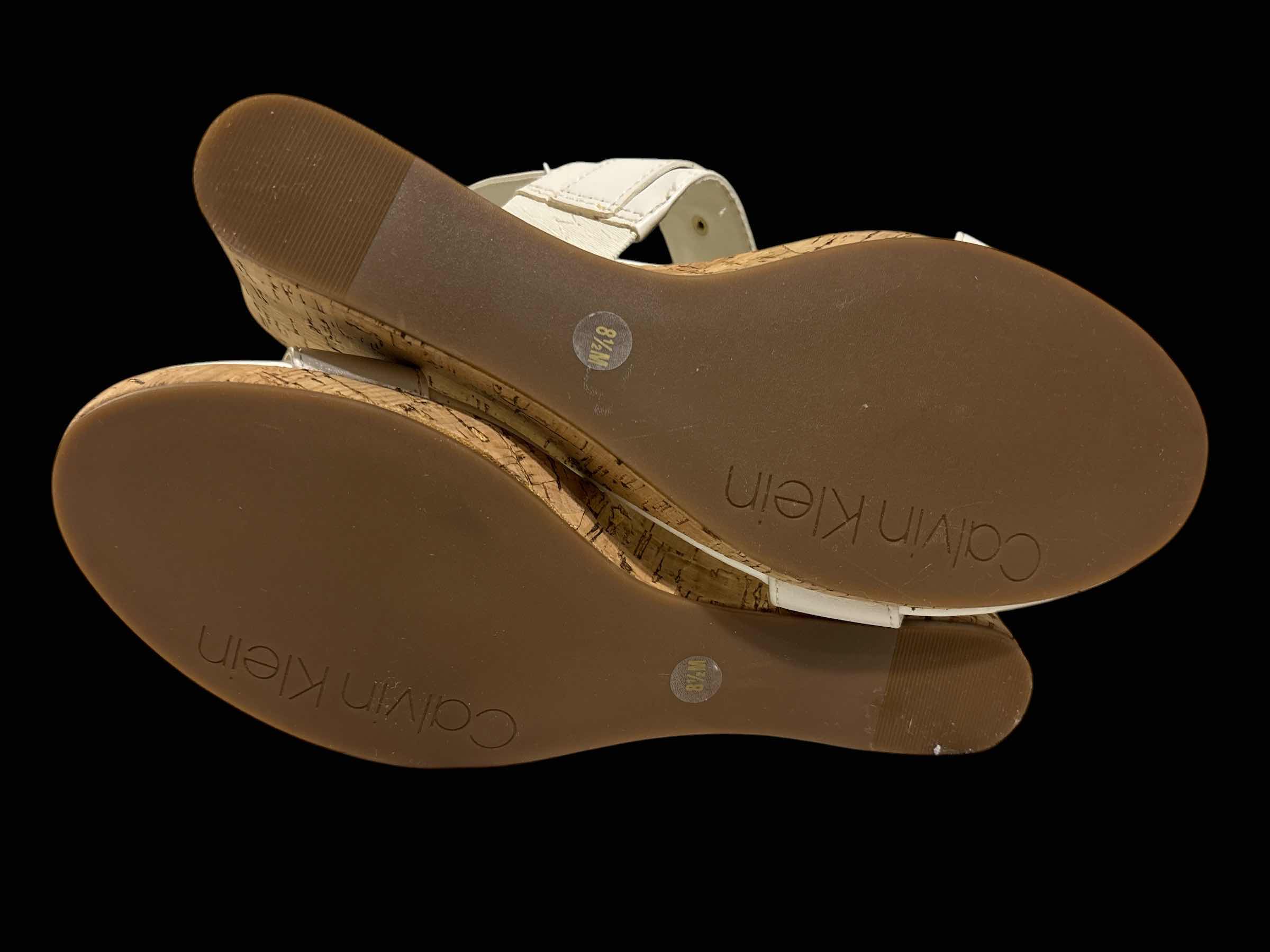 Photo 1 of CALVIN KLEIN BOMEGA WEDGE SANDALS W BUCKLE STRAPS, WHITE W GOLD ACCENTS WOMENS SIZE 8.5