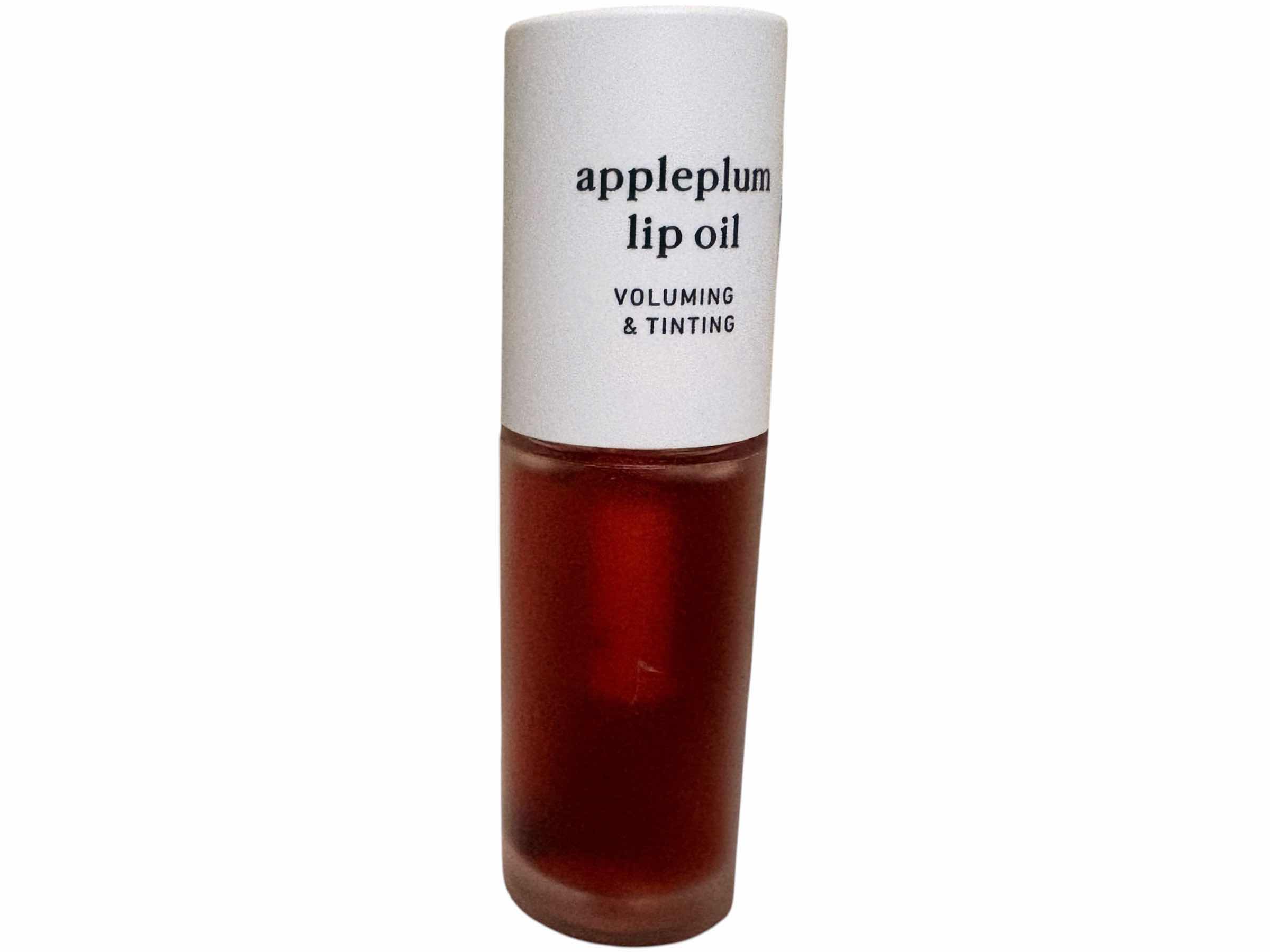 Photo 1 of APPLEPLUM LIP OIL AND OUHOE BITTER LIP BALM