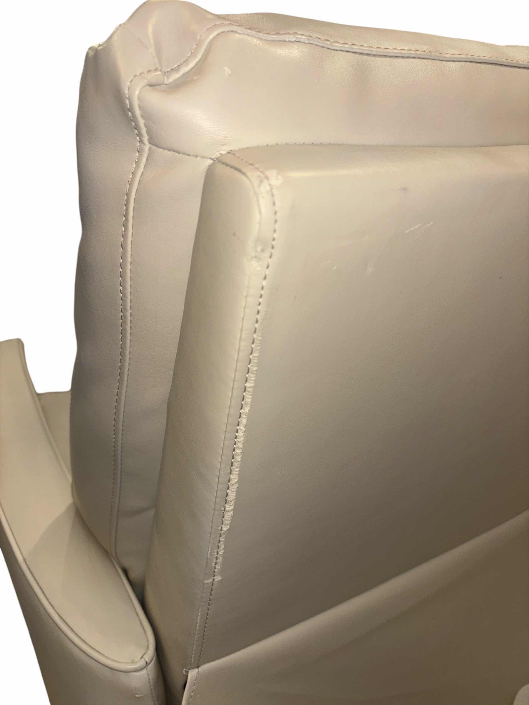 Photo 1 of CREAM FAUX LEATHER RECLINER 30” X 29” H39”