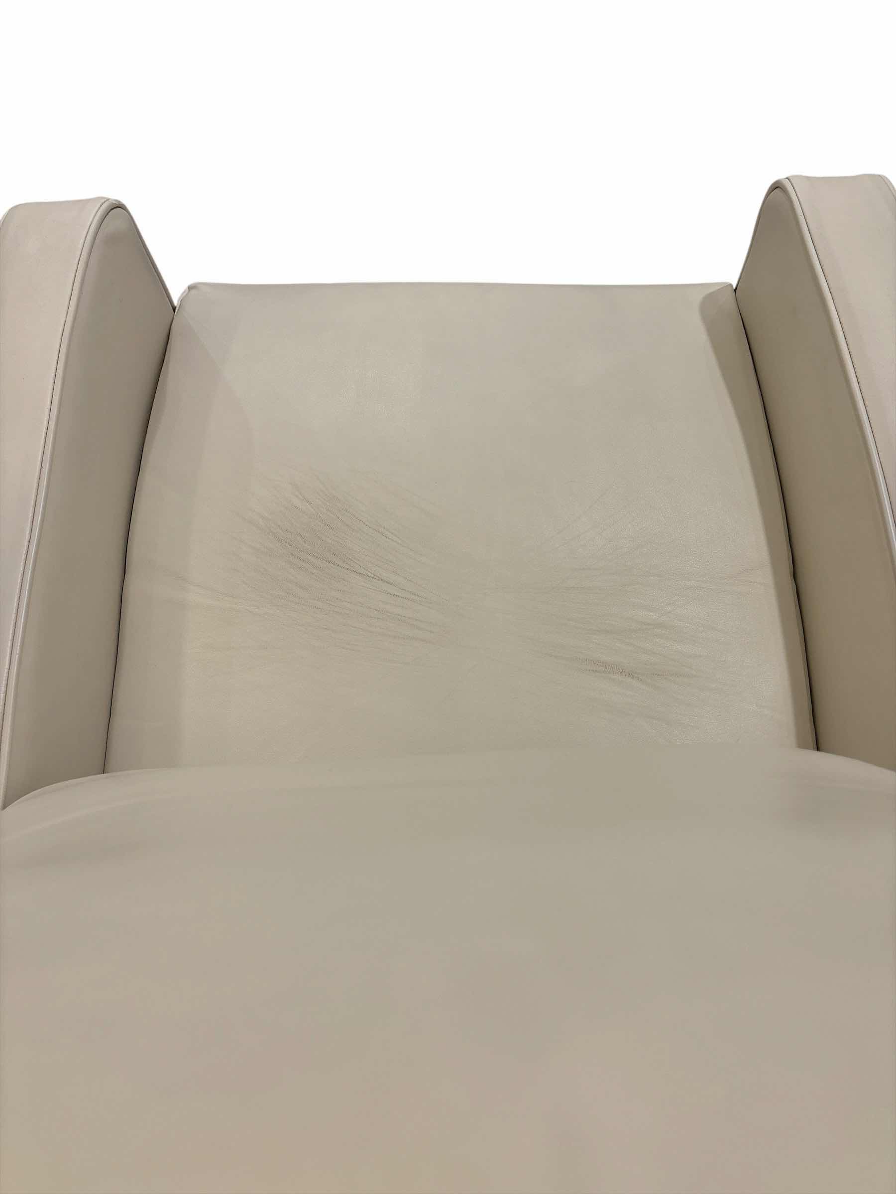 Photo 1 of CREAM FAUX LEATHER RECLINER 30” X 29” H39”