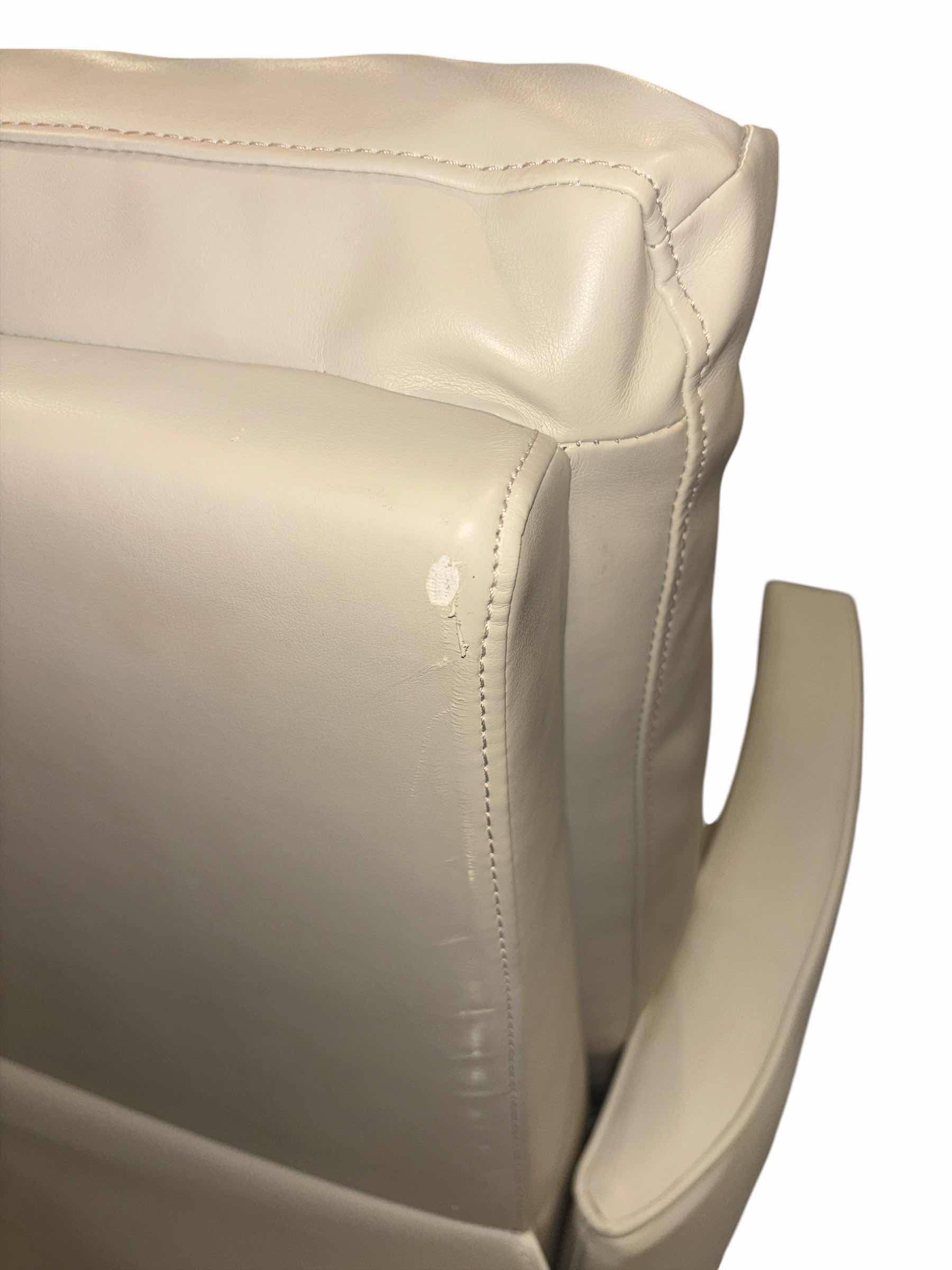 Photo 1 of CREAM FAUX LEATHER RECLINER 30” X 29” H39”