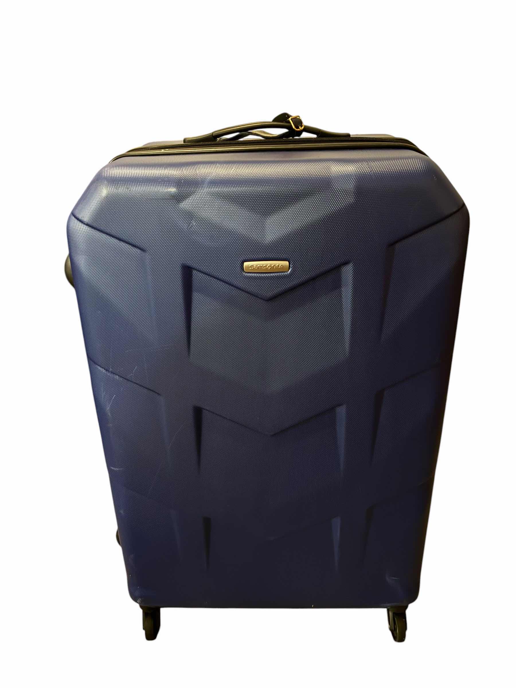 Photo 1 of SAMSONITE BLUE HARDSHELL ROLLING LUGGAGE CHECK BACK