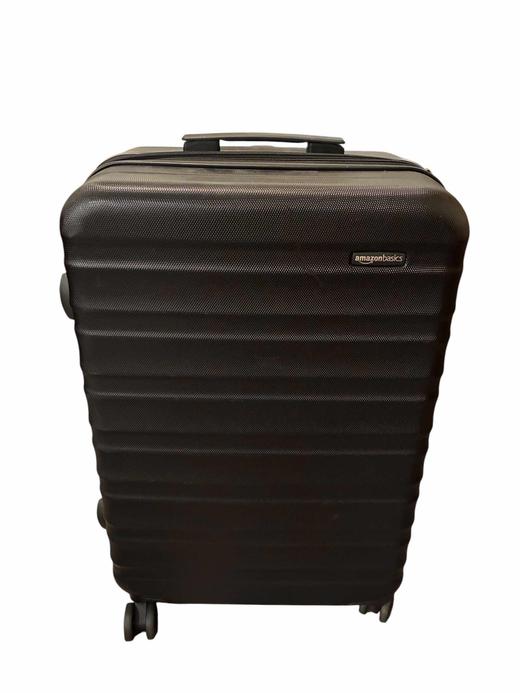 Photo 1 of AMAZON BASICS BLACK PART SHOW ROLLING LUGGAGE CARRY-ON BAG