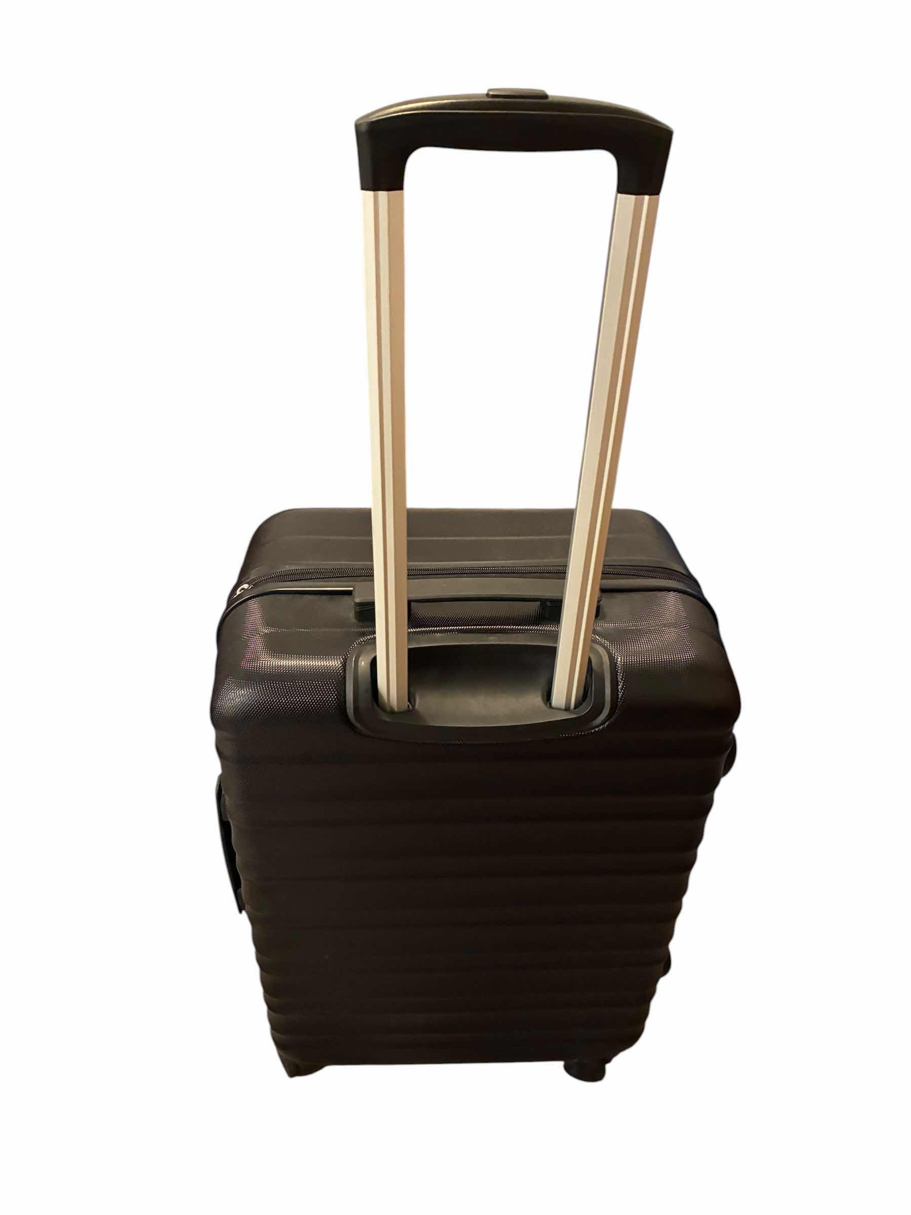 Photo 1 of AMAZON BASICS BLACK PART SHOW ROLLING LUGGAGE CARRY-ON BAG