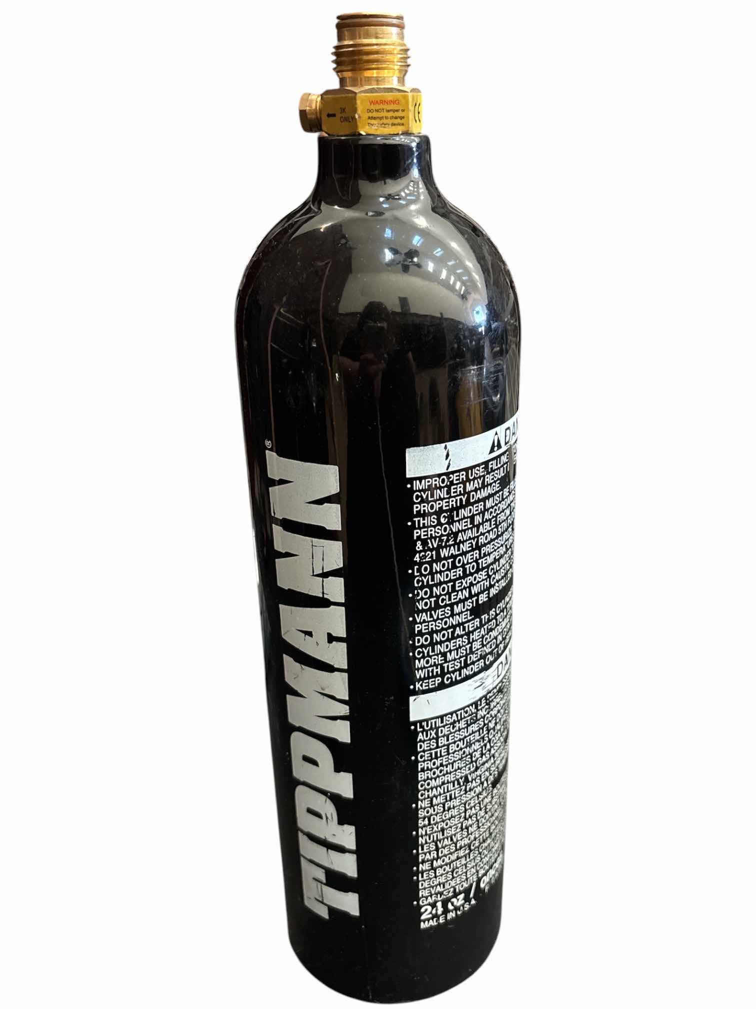 Photo 1 of TIPPMANN REFILLABLE CO2 PAINTBALL TANK, 24oz