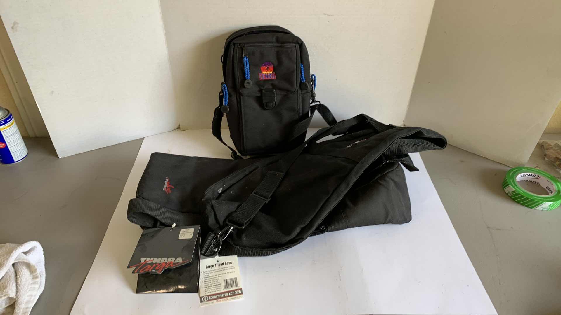 Photo 1 of 2 TRIPOD CASES AND A TENBA BAG