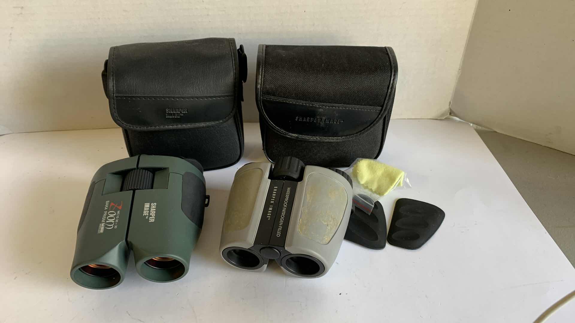 Photo 1 of 2 SHARPER IMAGE BINOCULARS