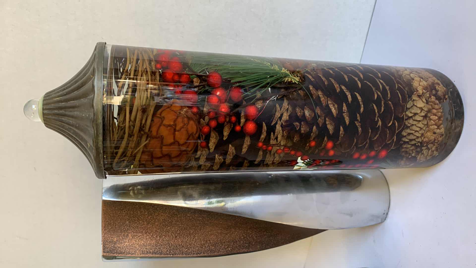 Photo 1 of 2-HOLIDAY OIL BURNING CANDLES, COPPER W SILVER VASE H13"