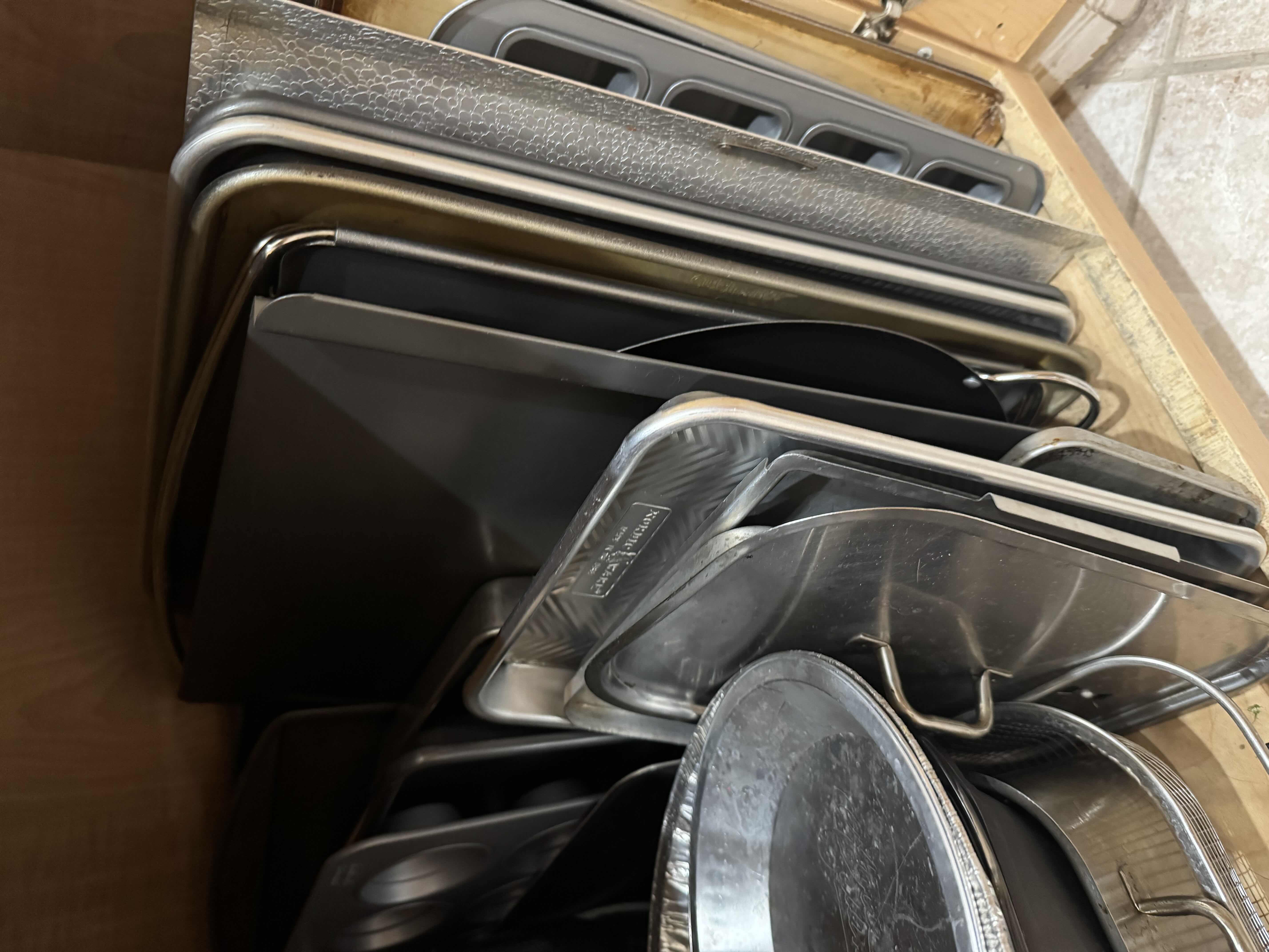 Photo 1 of CONTENTS OF CABINET-PANS, COOKIE SHEETS, STOCK POTS