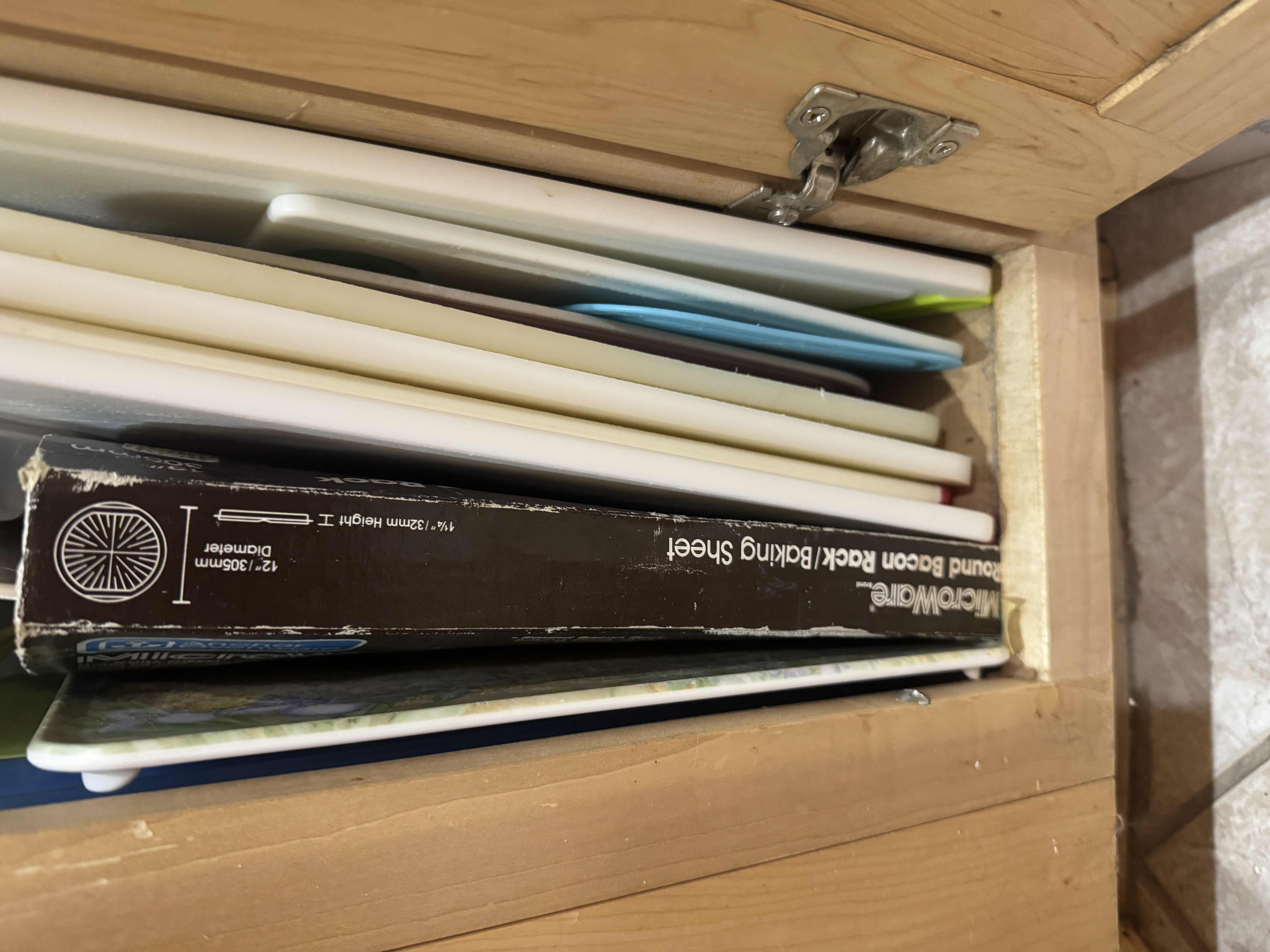 Photo 1 of CONTENTS OF CABINET-CUTTING BOARDS, MICROWAVE BACON RACK