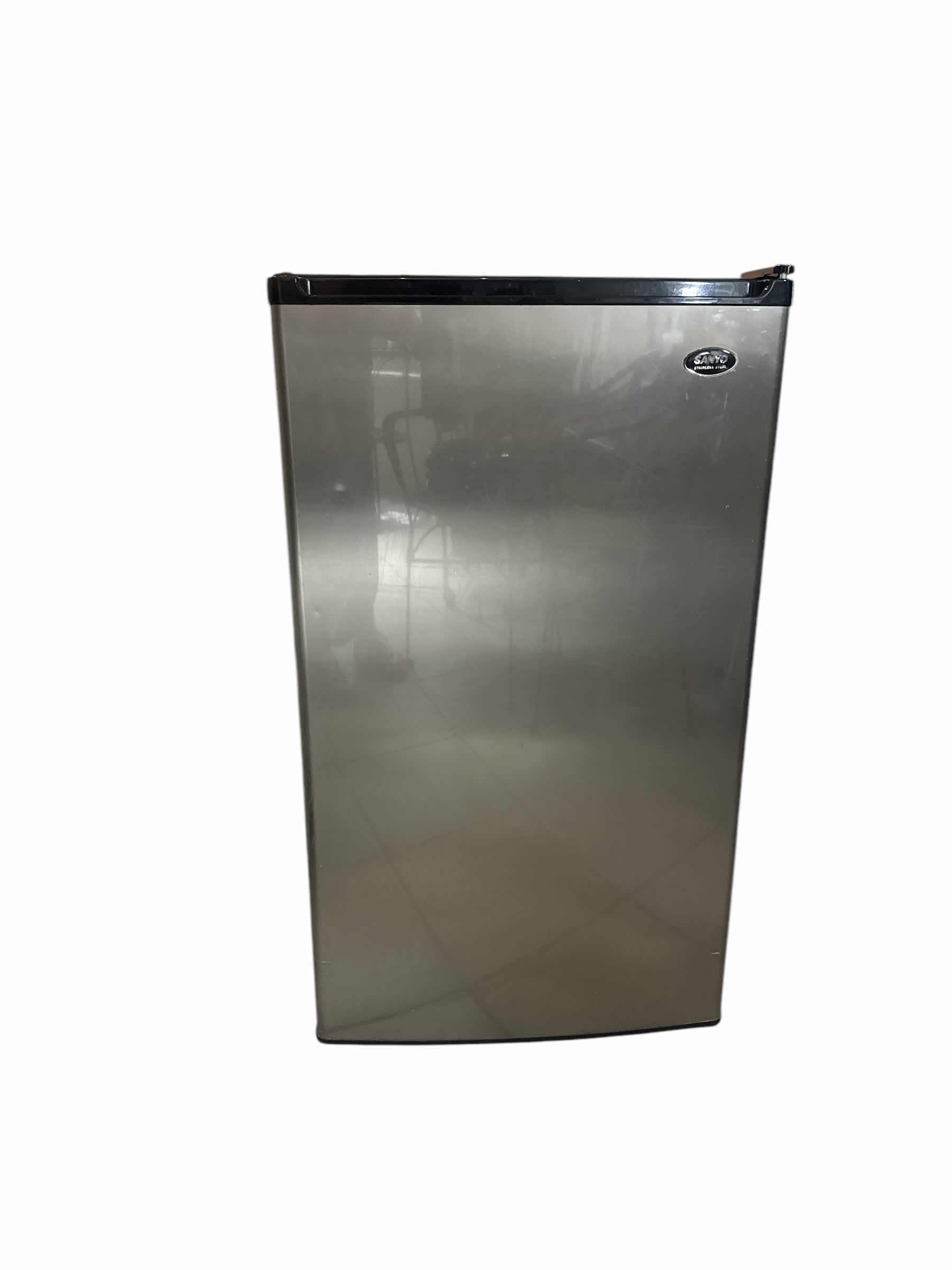 Photo 1 of SANYO STAINLESS STEEL MINI FRIDGE
19“ x 19“ H 33 “