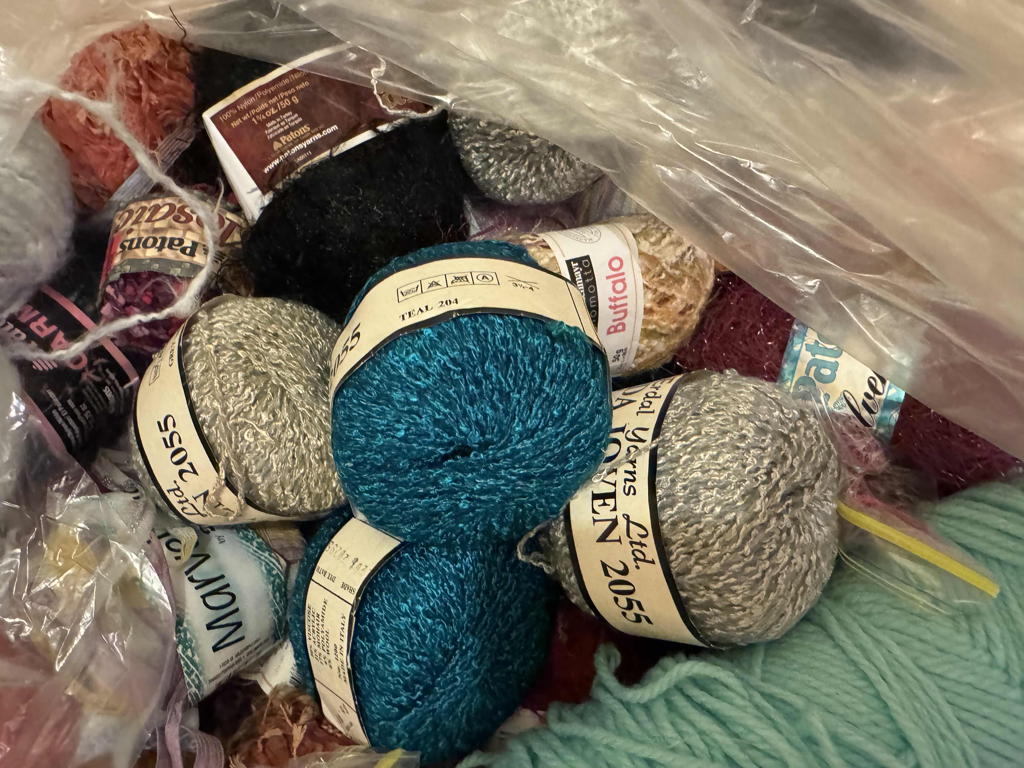 Photo 1 of LARGE BAG OF YARN/SPECIALTY FIBER ART MATERIAL