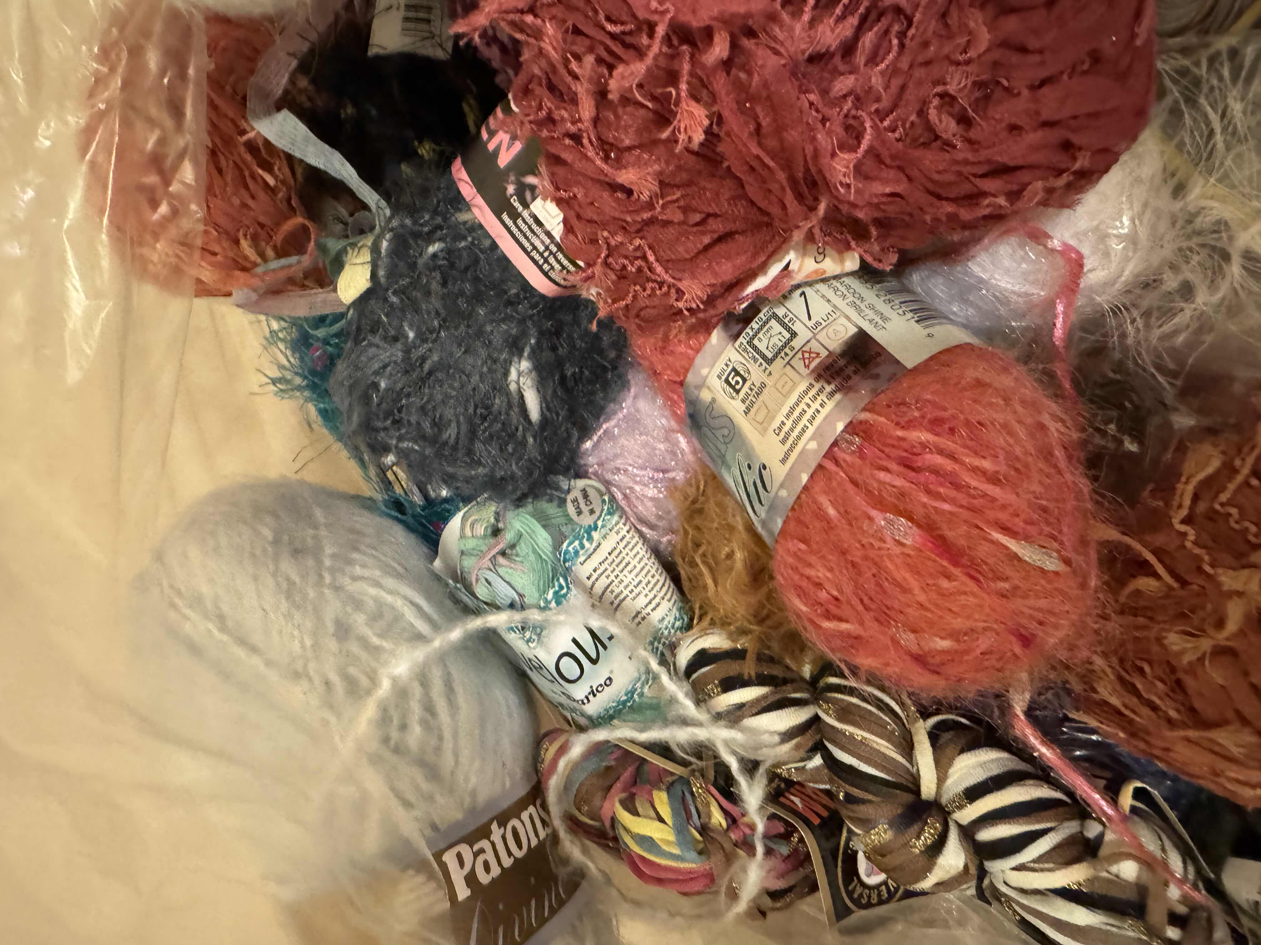Photo 1 of LARGE BAG OF YARN/SPECIALTY FIBER ART MATERIAL