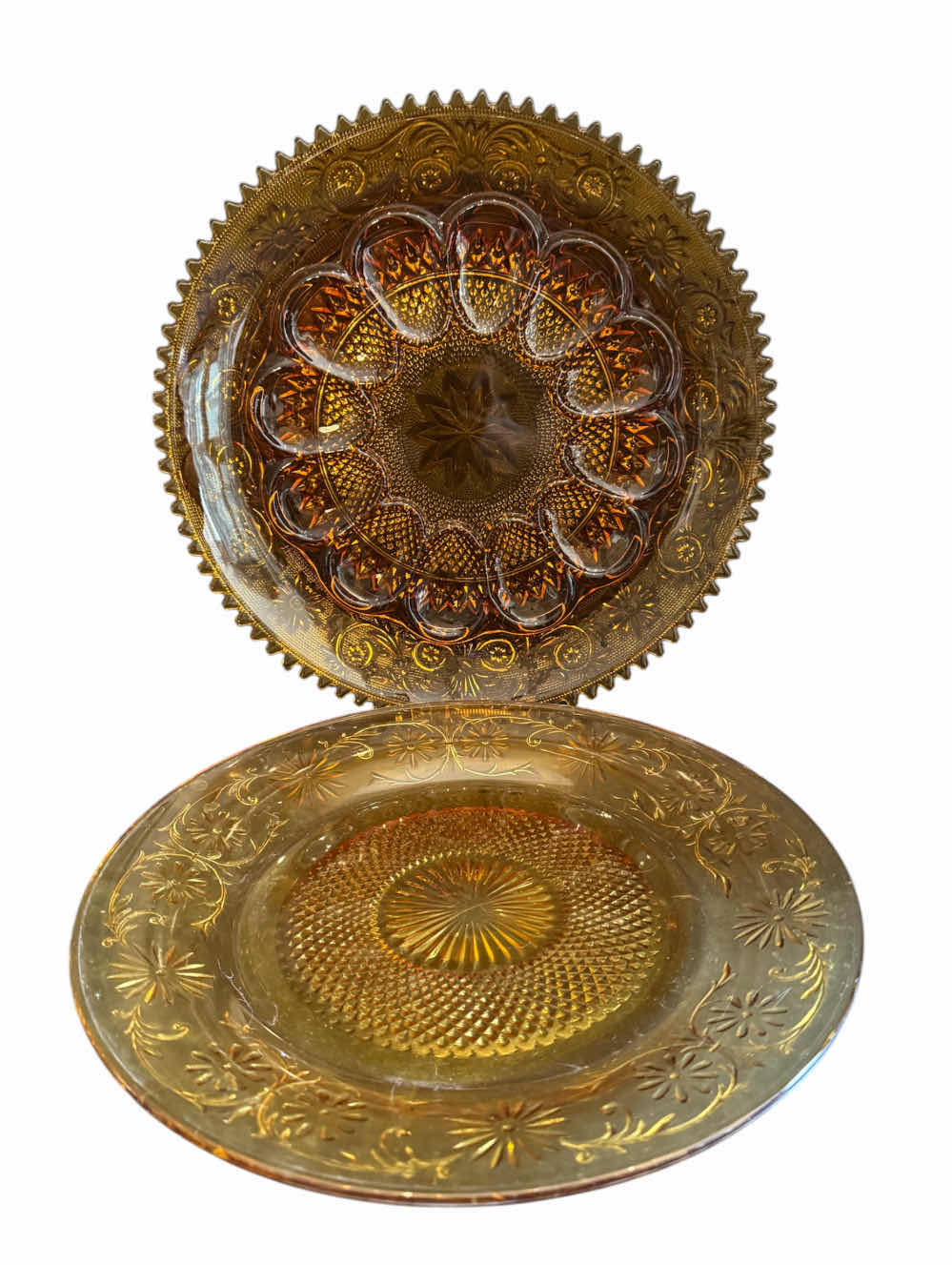 Photo 1 of VINTAGE AMBER DEPRESSION GLASS SERVING TRAYS

D11.25” X H1”

D12” X H1.5”