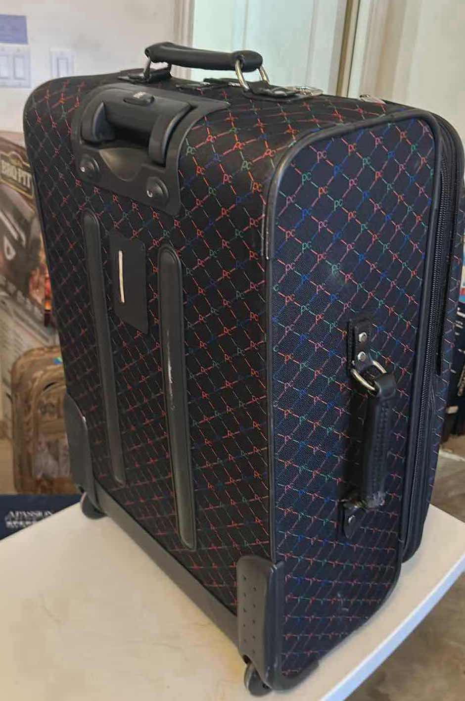Photo 1 of PIERRE CARDIN 28” WHEELS LUGGAGE