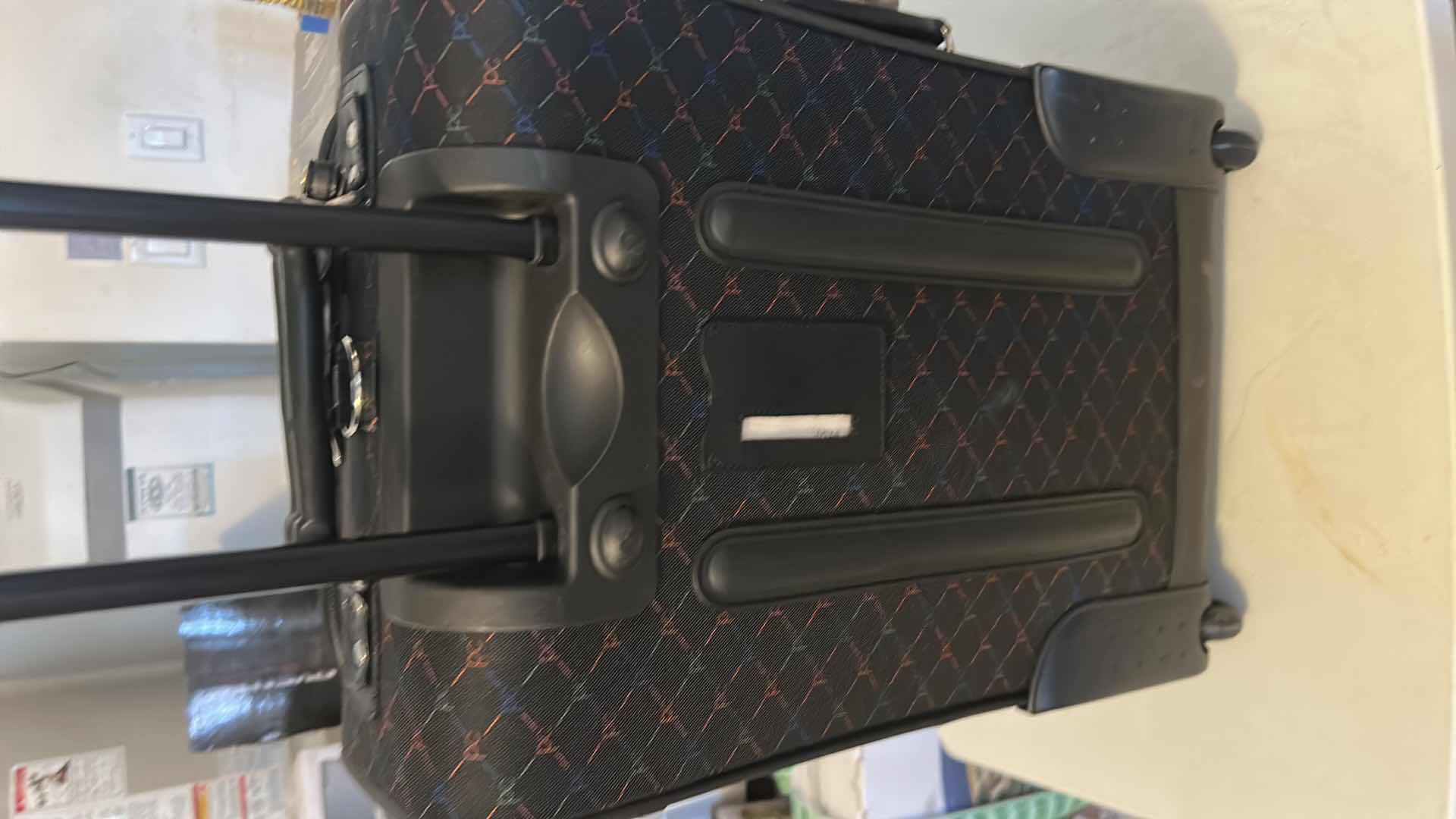 Photo 1 of PIERRE CARDIN 22” WHEELS LUGGAGE